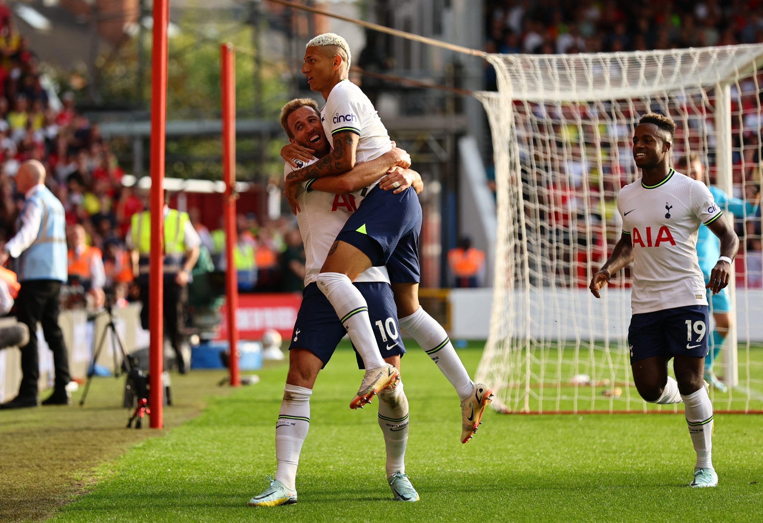 Tottenham Hotspur's Harry Kane celebrates scoring their second goal with Richarlison and Ryan Sessegnon