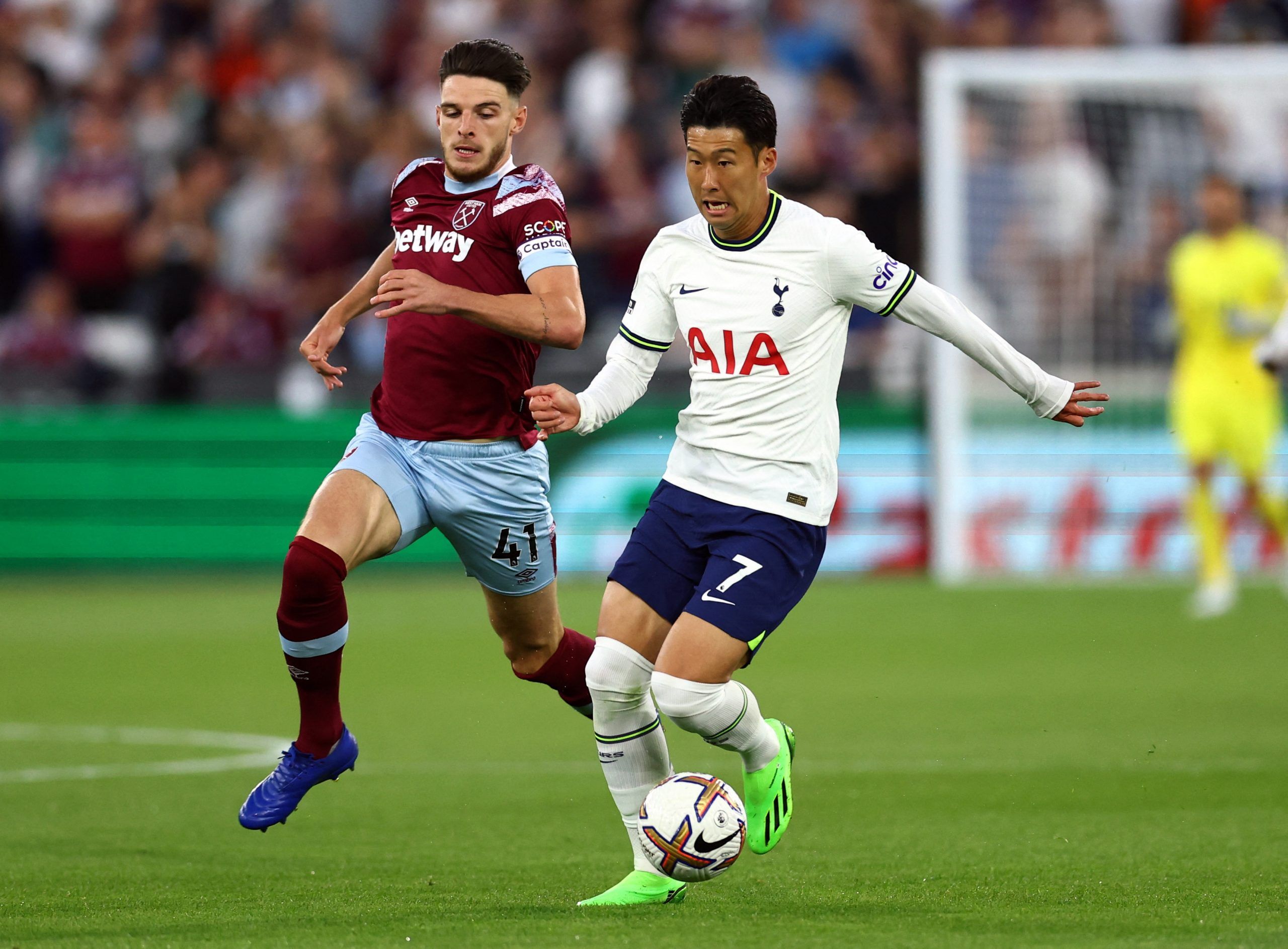 West Ham United's Declan Rice in action with Tottenham Hotspur's Son Heung-min