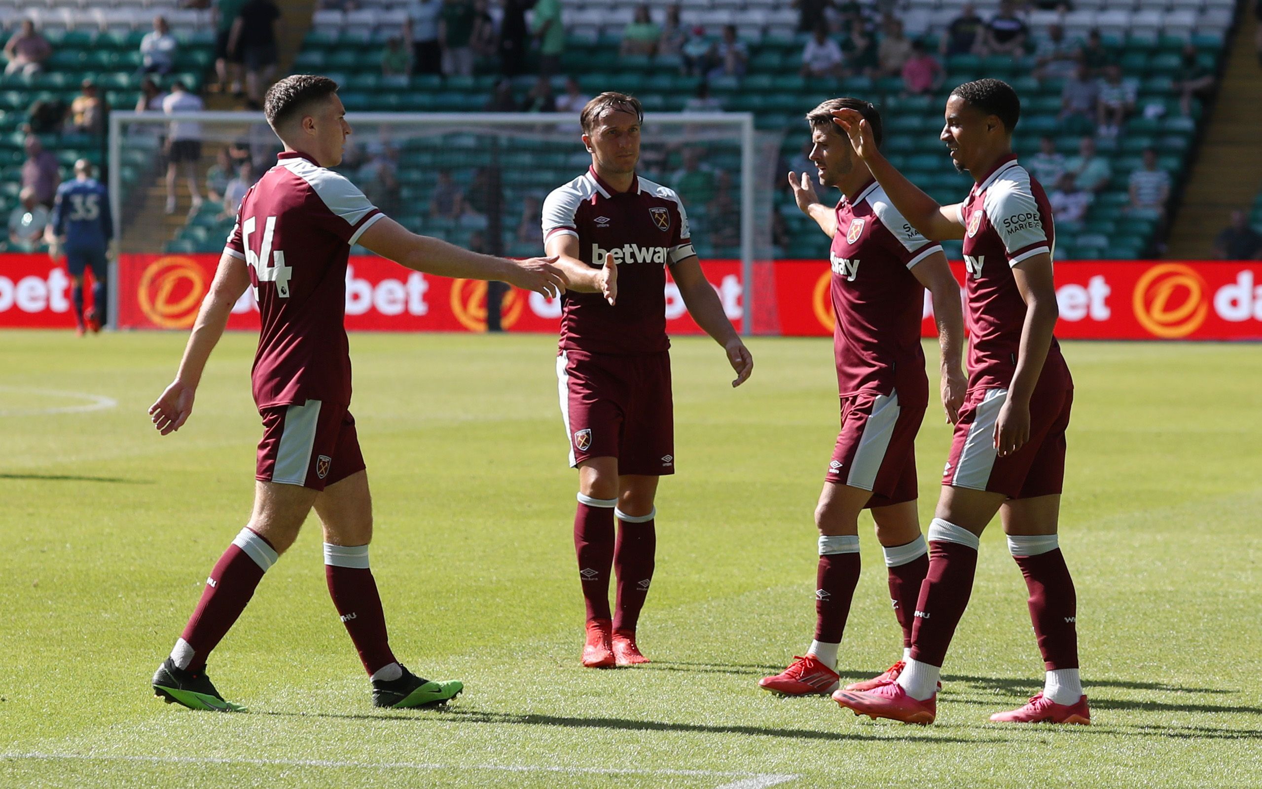 Soccer Football - Pre Season Friendly - Celtic v West Ham United - Celtic Park, Glasgow, Scotland, Britain - July 24, 2021 West Ham United's Armstrong Okoflex celebrates scoring their sixth goal with teammates REUTERS/Russell Cheyne