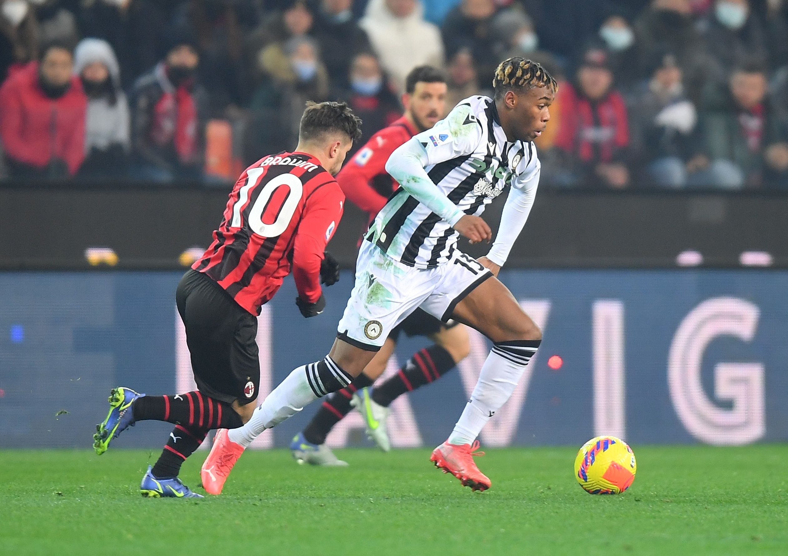 Soccer Football - Serie A - Udinese v AC Milan - Dacia Arena, Udine, Italy - December 11, 2021 Udinese's Destiny Udogie in action with AC Milan's Brahim Diaz REUTERS/Daniele Mascolo