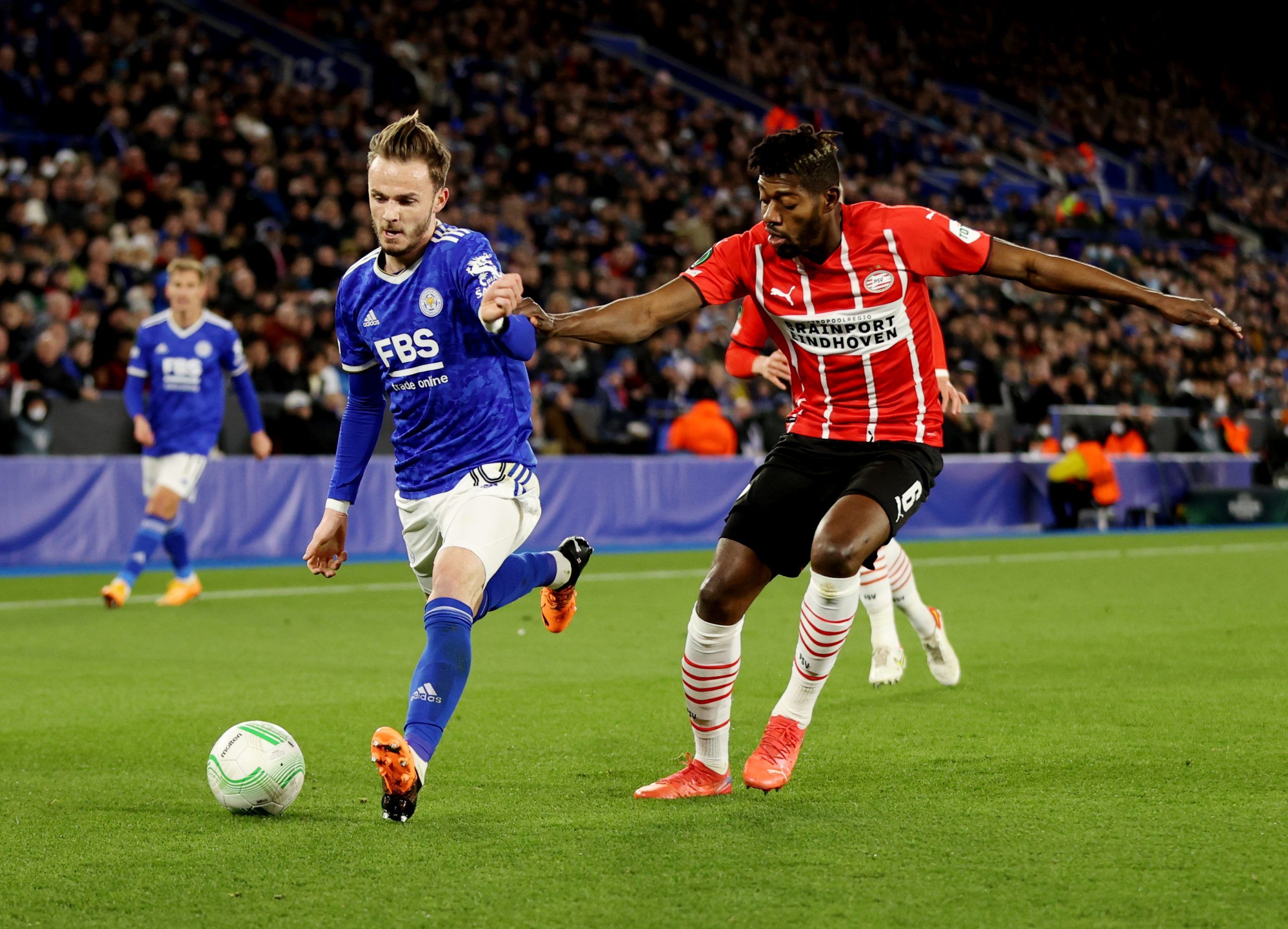 Soccer Football - Europa League - Quarter Final - First Leg - Leicester City v PSV Eindhoven - King Power Stadium, Leicester, Britain - April 7, 2022 Leicester City's James Maddison in action with PSV Eindhoven's Ibrahim Sangare Action Images via Reuters/Molly Darlington