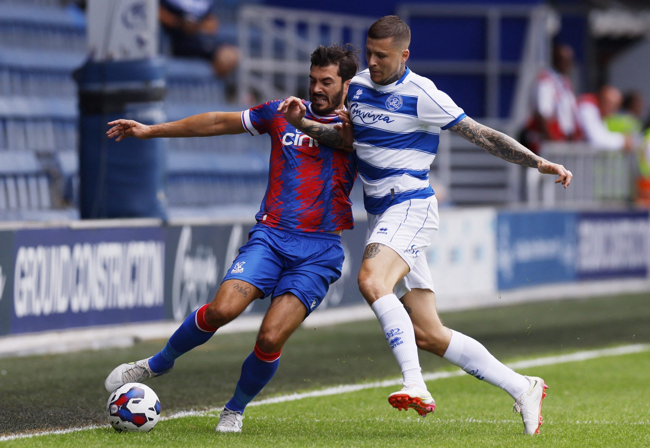 Soccer Football - Pre Season Friendly - Queens Park Rangers v Crystal Palace - Loftus Road, London, Britain - July 23, 2022 Queens Park Rangers' Lyndon Dykes in action with Crystal Palace's James Tomkins Action Images via Reuters/Andrew Couldridge