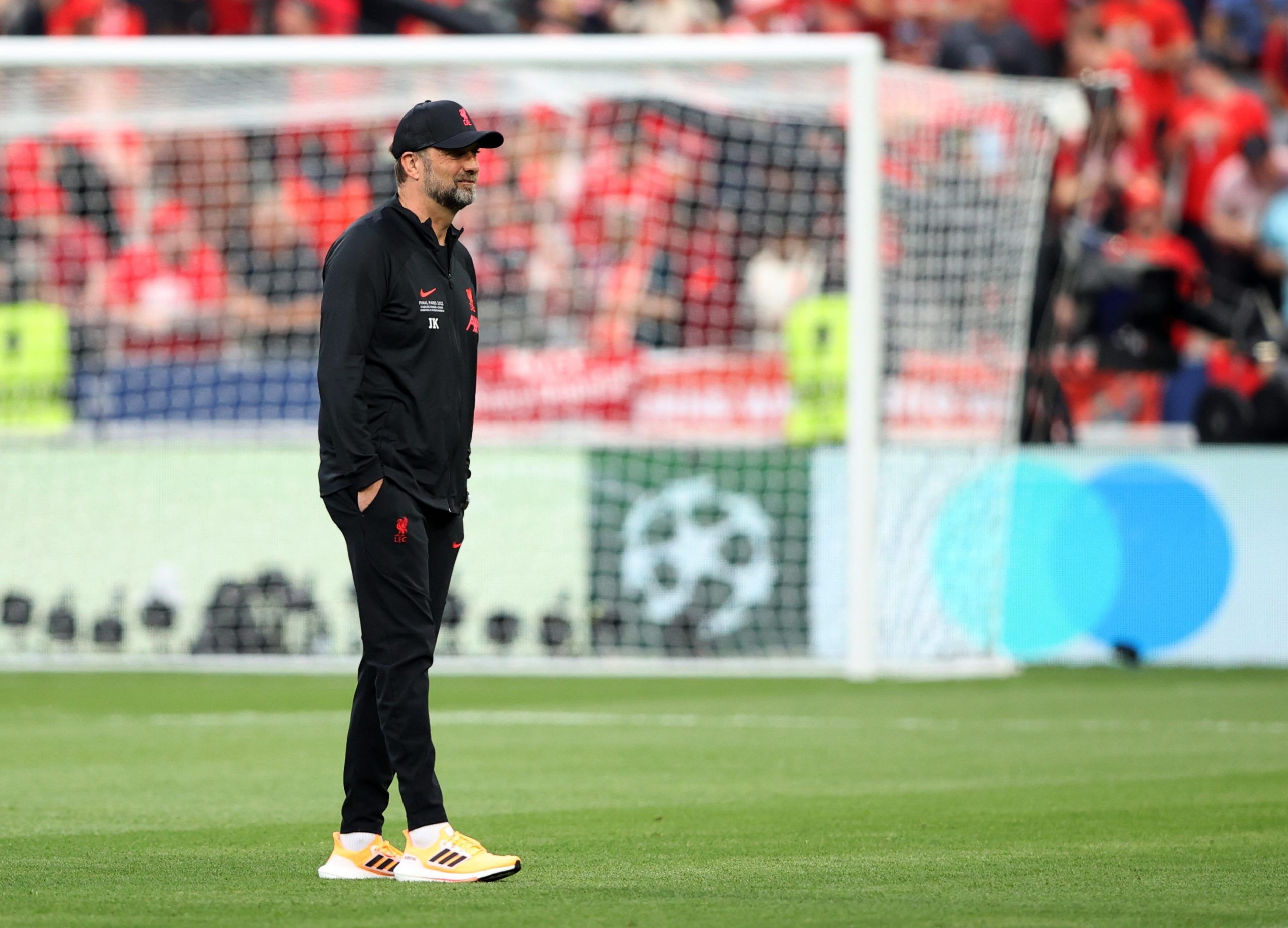 Soccer Football - Champions League Final - Liverpool v Real Madrid - Stade de France, Saint-Denis near Paris, France - May 28, 2022 Liverpool manager Juergen Klopp looks on as the players warm up as the match is delayed REUTERS/Molly Darlington