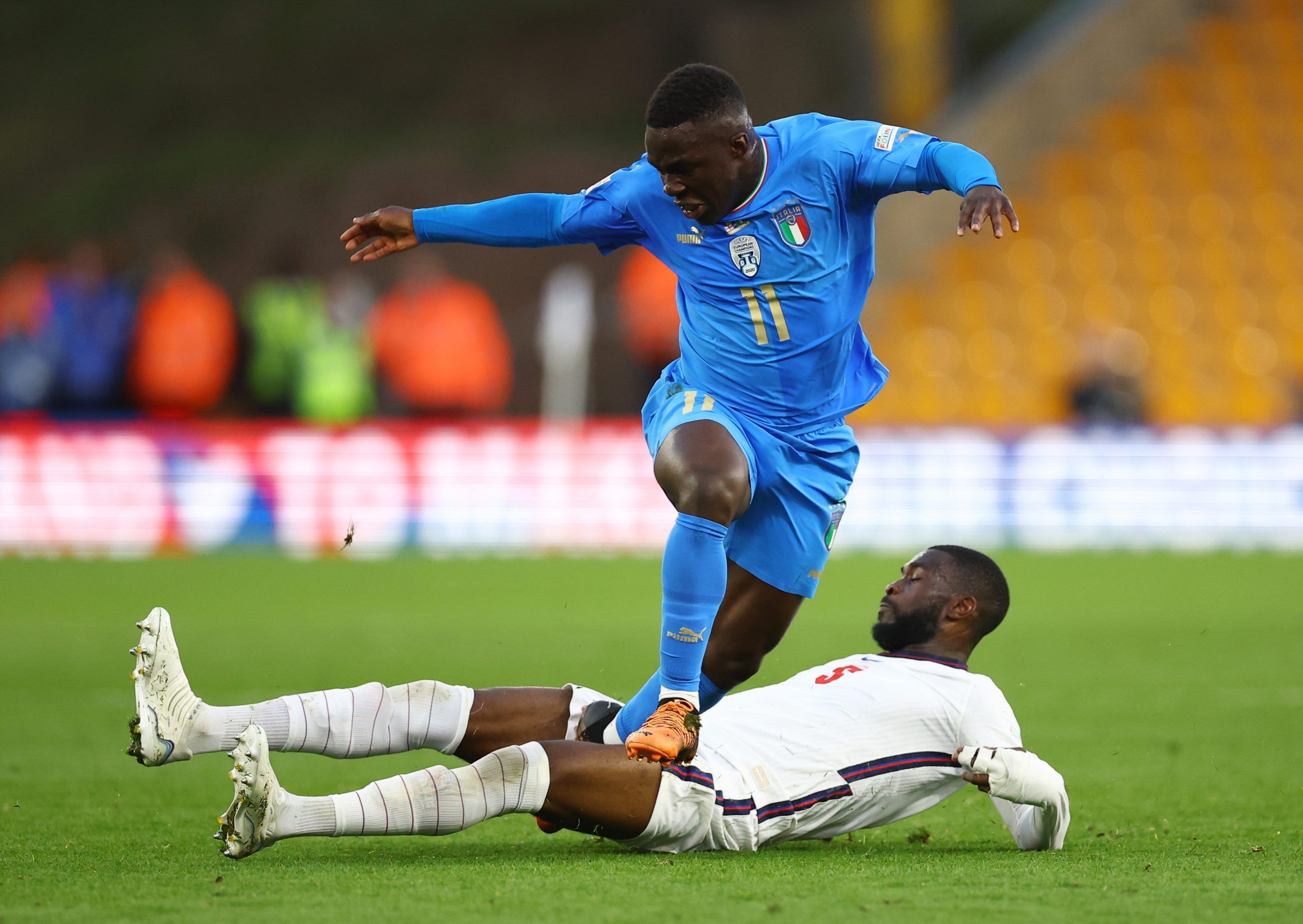 Soccer Football - UEFA Nations League - Group C - England v Italy - Molineux Stadium, Wolverhampton, Britain - June 11, 2022 Italy's Wilfried Gnonto in action with England's Fikayo Tomori REUTERS/Hannah Mckay