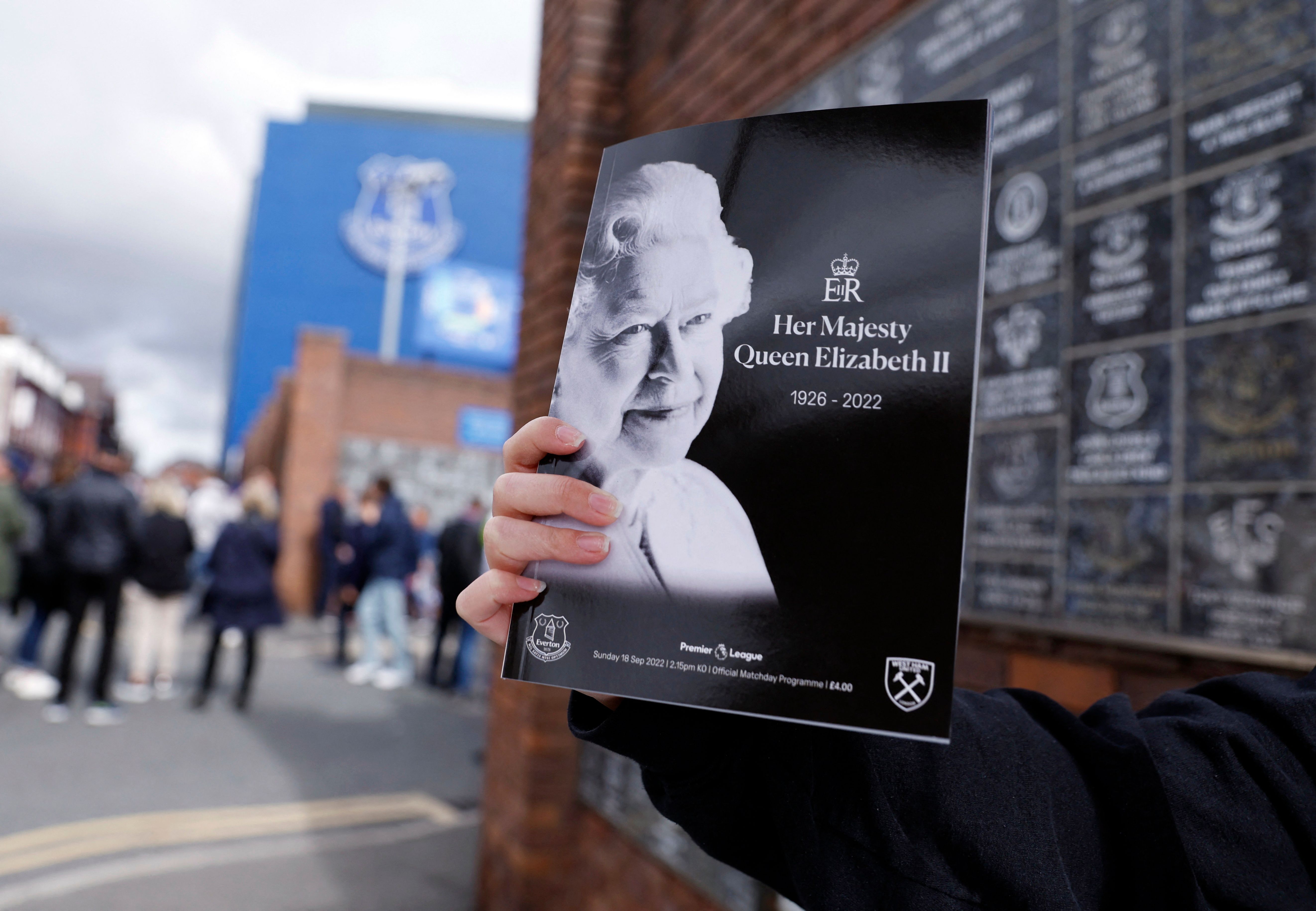 Soccer Football - Premier League - Everton v West Ham United - Goodison Park, Liverpool, Britain - September 18, 2022 General view of a matchday programme for sale outside the stadium with Britain's Queen Elizabeth on the front cover, following the death of Britain's Queen Elizabeth Action Images via Reuters/Jason Cairnduff EDITORIAL USE ONLY. No use with unauthorized audio, video, data, fixture lists, club/league logos or 'live' services. Online in-match use limited to 75 images, no video emula