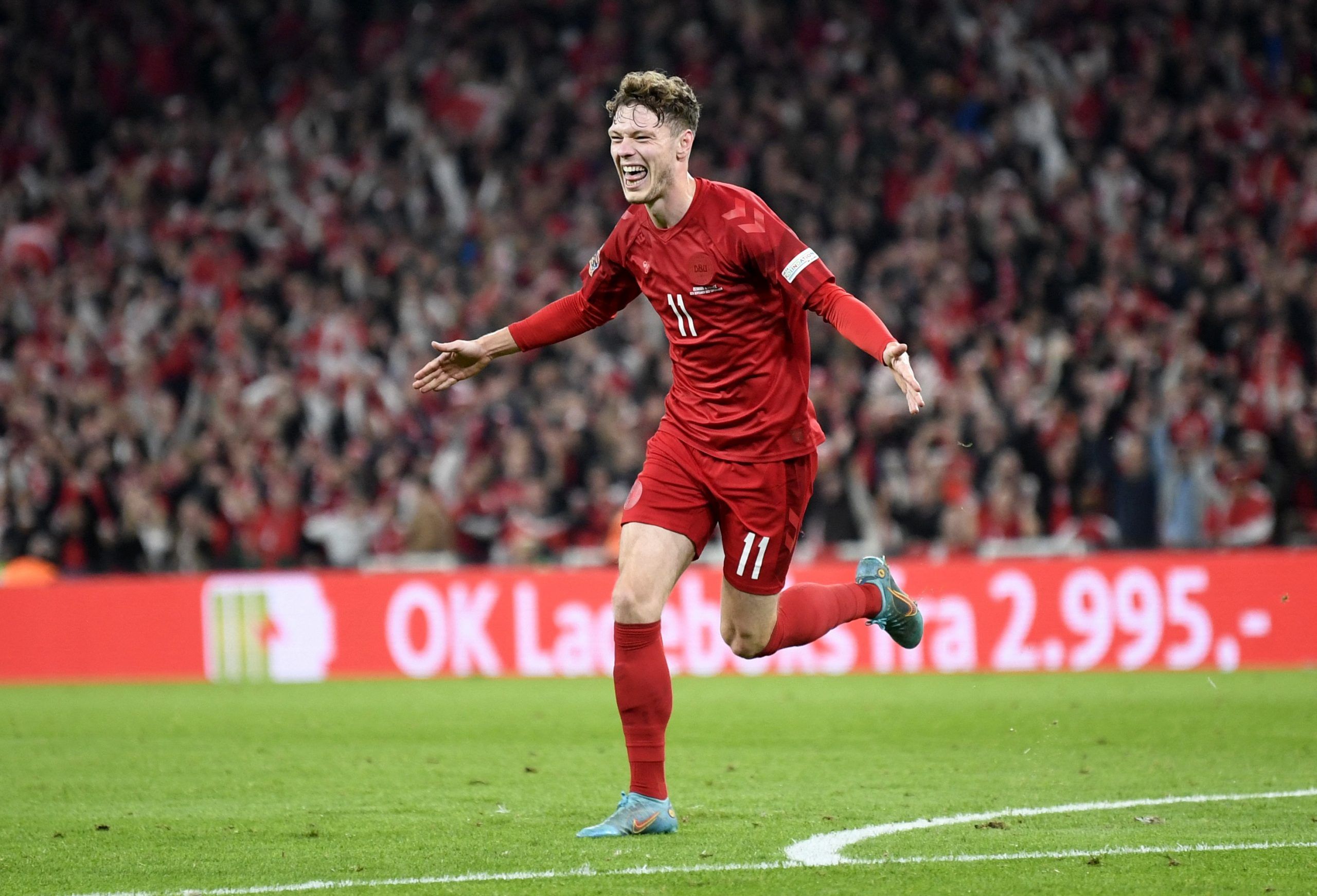 Denmark's Andreas Skov Olsen celebrates scoring their second goal vs France.