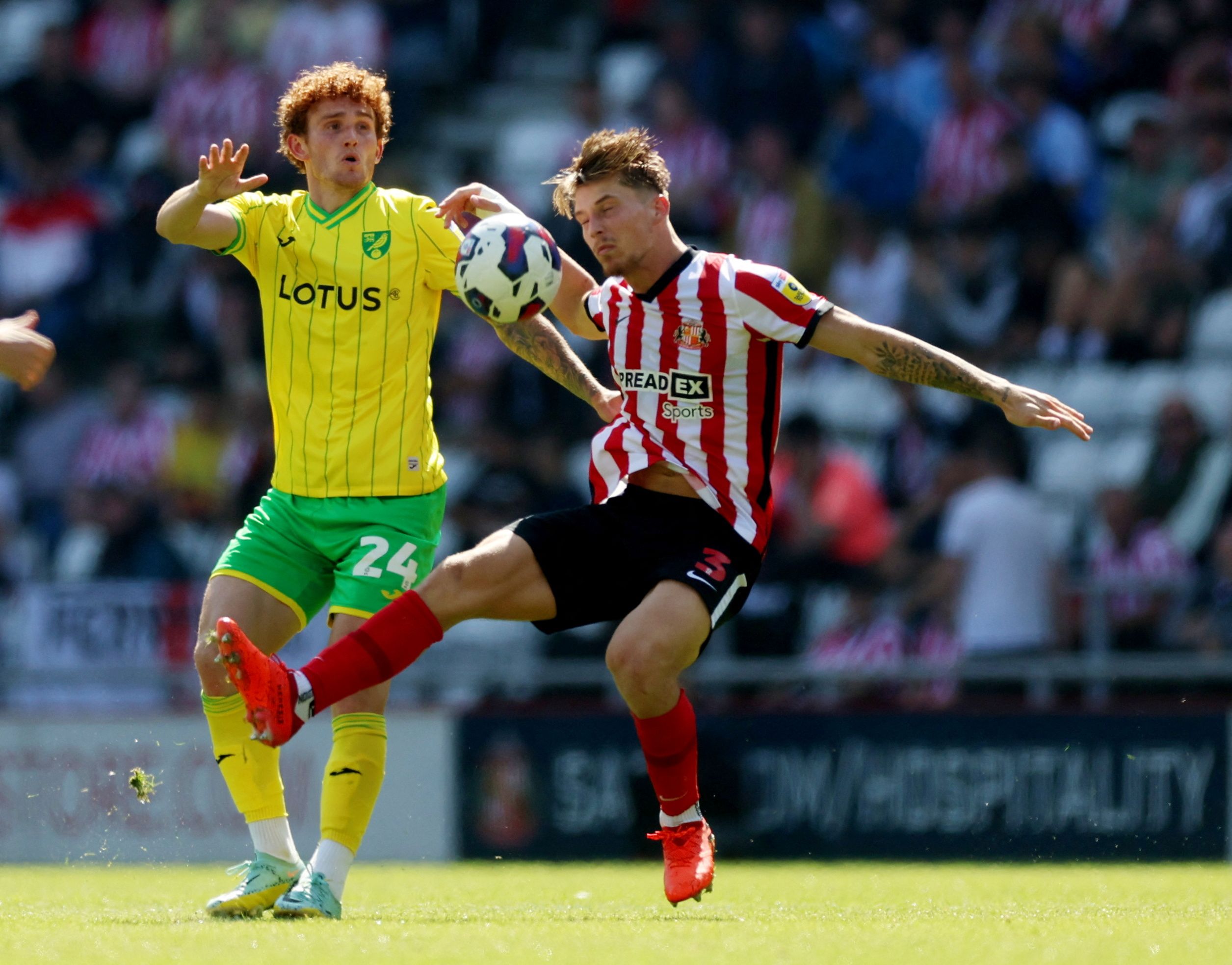 Soccer Football - Championship - Sunderland v Norwich City - Stadium of Light, Sunderland, Britain - August 27, 2022 Sunderland?s Dennis Cirkin in action with Norwich City's Joshua Sargent  Action Images/Lee Smith  EDITORIAL USE ONLY. No use with unauthorized audio, video, data, fixture lists, club/league logos or 