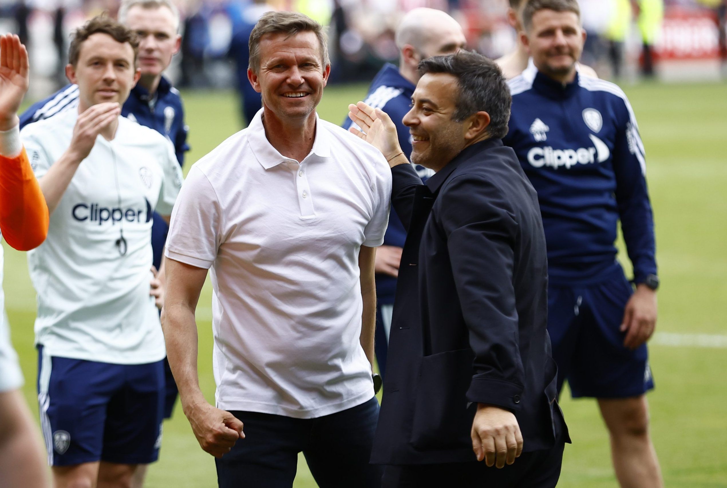 Leeds United manager Jesse Marsch and owner Andrea Radrizzani celebrate after the match as Leeds United avoid relegation from the Premier League