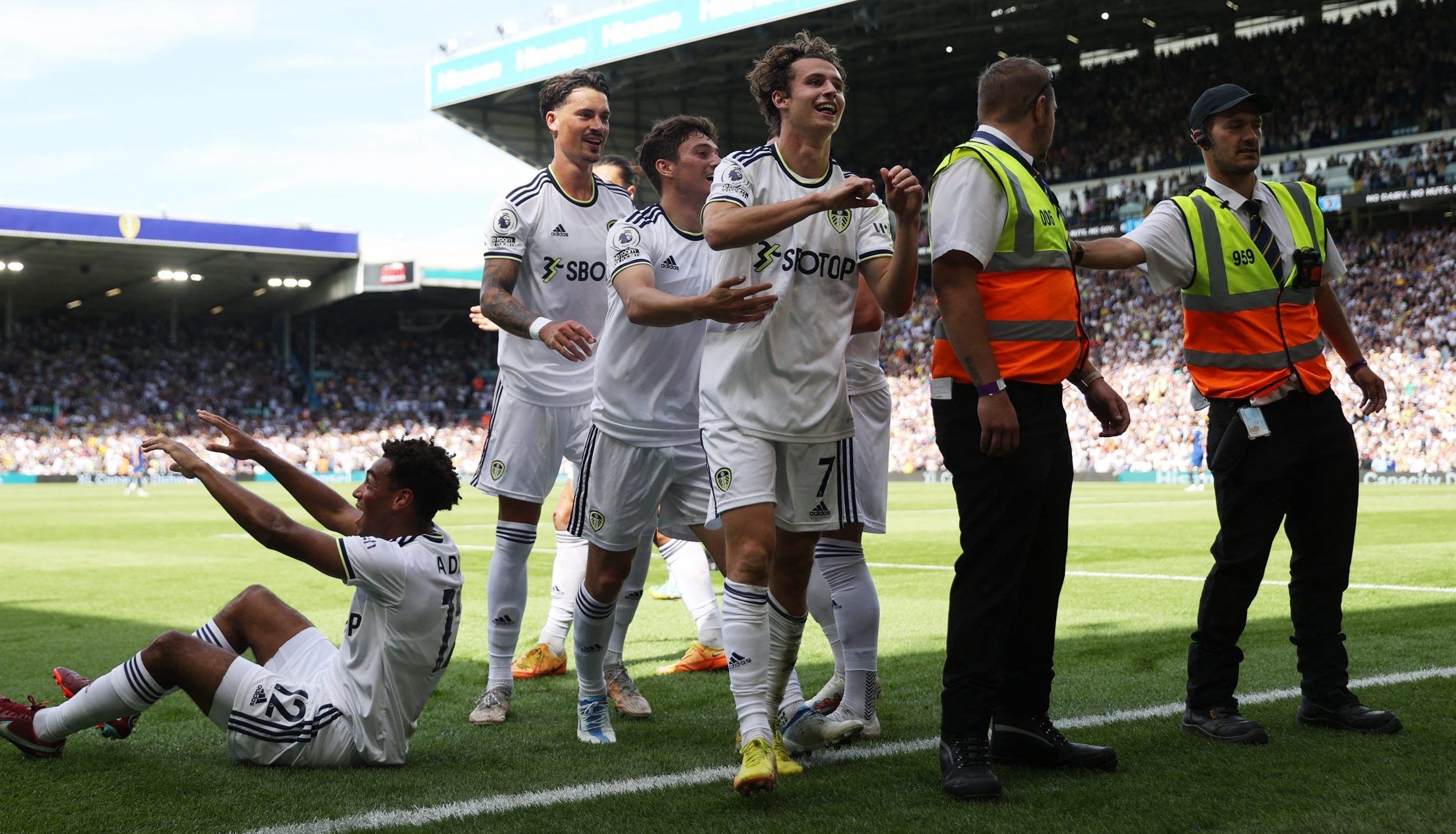 Leeds United's Brenden Aaronson celebrates scoring their first goal with teammates