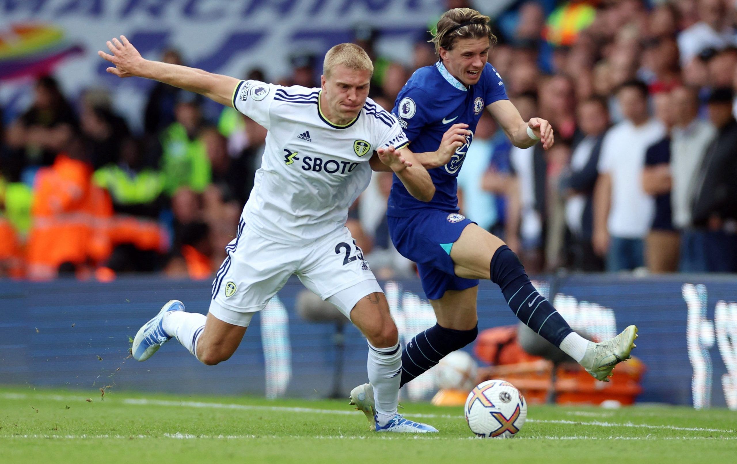 Leeds United's Rasmus Kristensen in action with Chelsea's Conor Gallagher