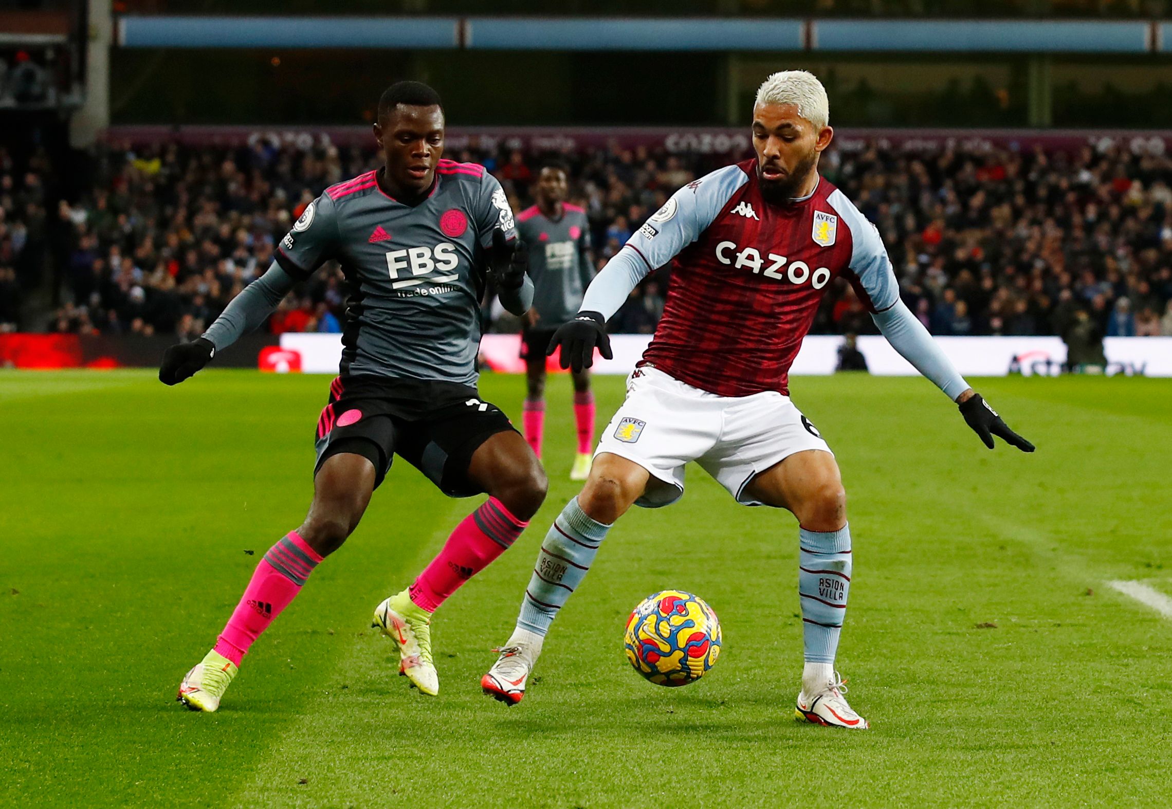 Leicester City's Patson Daka in action with Aston Villa's Douglas Luiz 