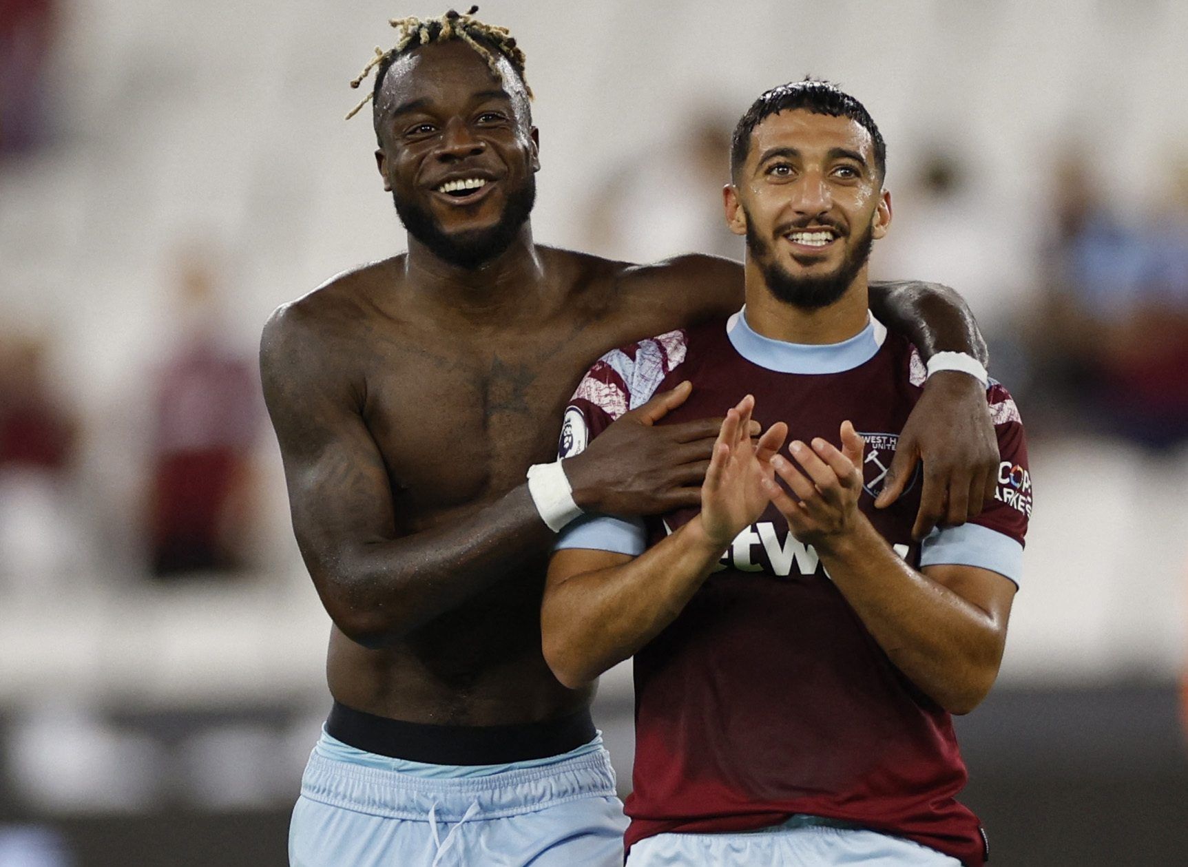 Soccer Football - Europa Conference League - Qualifying - Play off First Leg -  West Ham United v Viborg FF - London Stadium, London, Britain - August 18, 2022 West Ham United's Maxwel Cornet and Said Benrahma celebrate after the match Action Images via Reuters/John Sibley