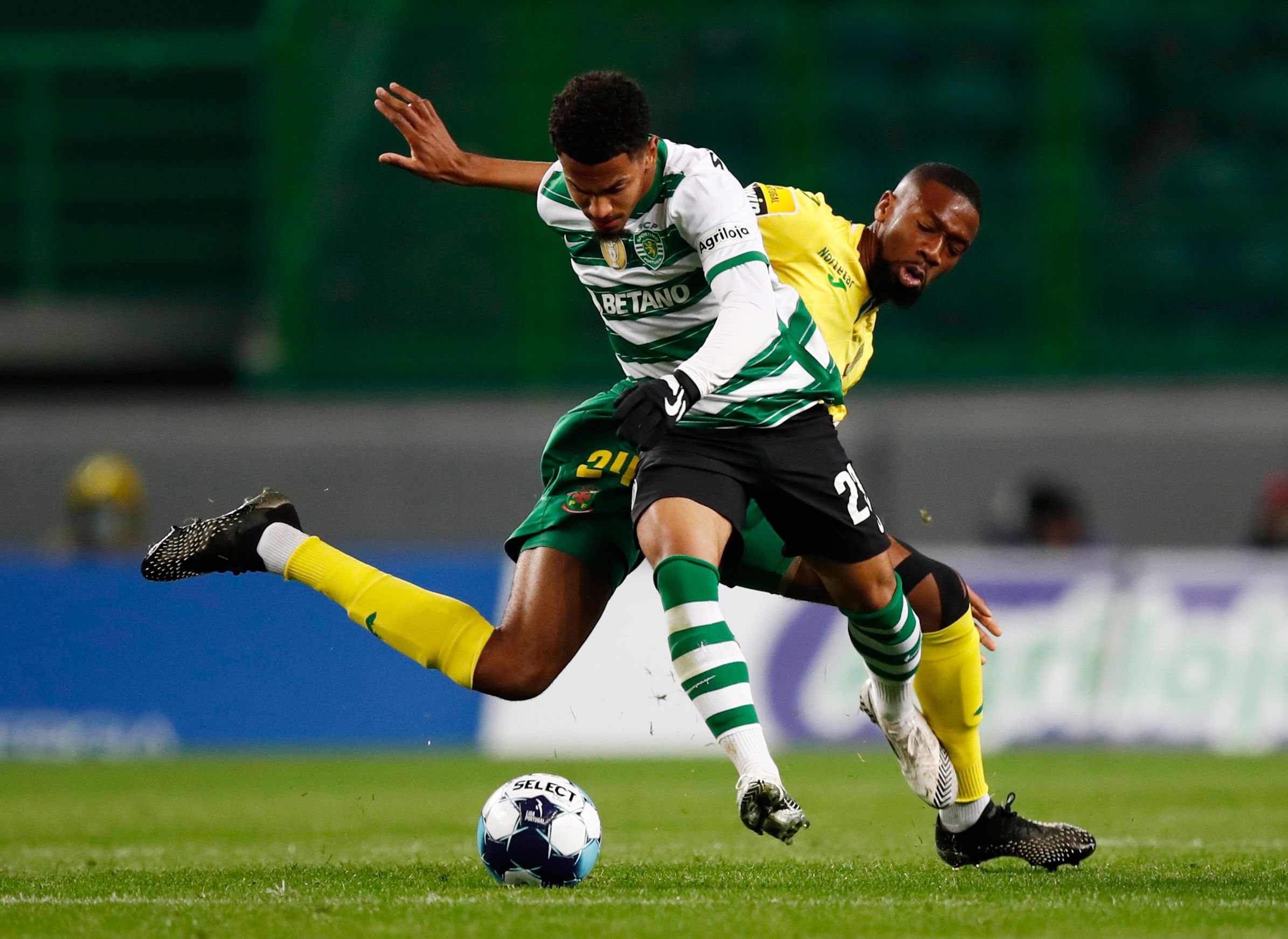  Pacos de Ferreira's Mohamed Diaby in action with Sporting CP's Marcus Edwards