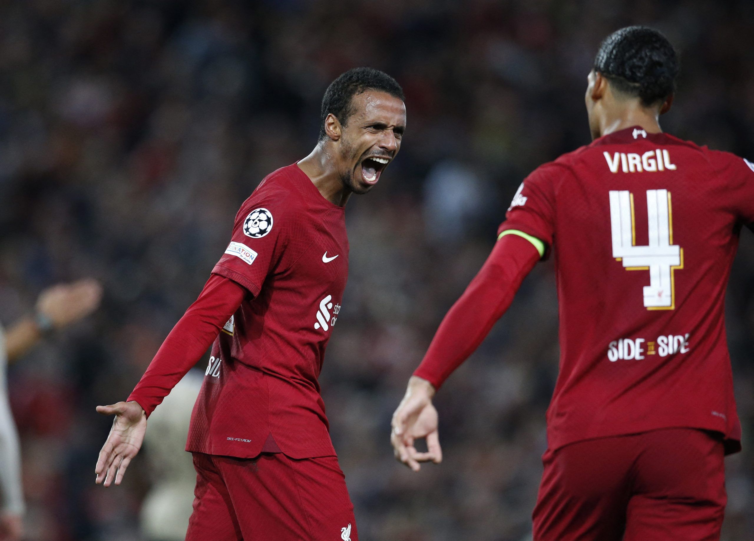 Soccer Football - Champions League - Group A - Liverpool v Ajax Amsterdam - Anfield, Liverpool, Britain - September 13, 2022  Liverpool's Joel Matip celebrates scoring their second goal with Virgil van Dijk Action Images via Reuters/Ed Sykes