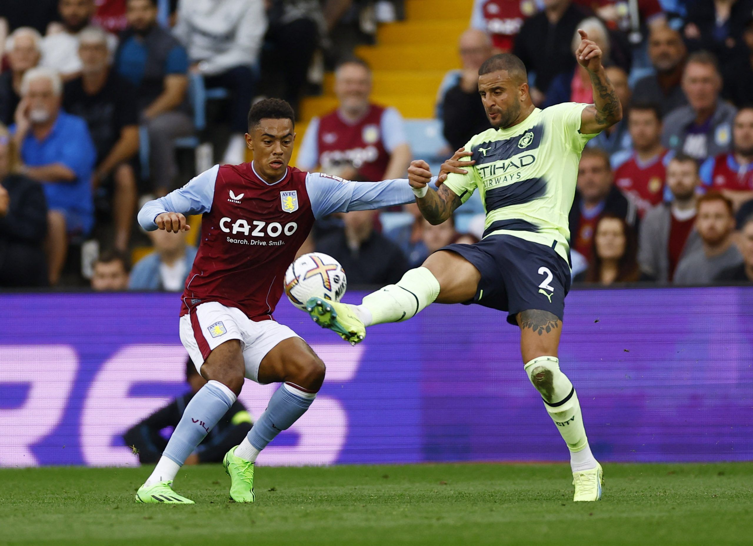 Soccer Football - Premier League - Aston Villa v Manchester City - Villa Park, Birmingham, Britain - September 3, 2022 Manchester City's Kyle Walker in action with Aston Villa's Jacob Ramsey Action Images via Reuters/Andrew Boyers EDITORIAL USE ONLY. No use with unauthorized audio, video, data, fixture lists, club/league logos or 'live' services. Online in-match use limited to 75 images, no video emulation. No use in betting, games or single club /league/player publications.  Please contact your