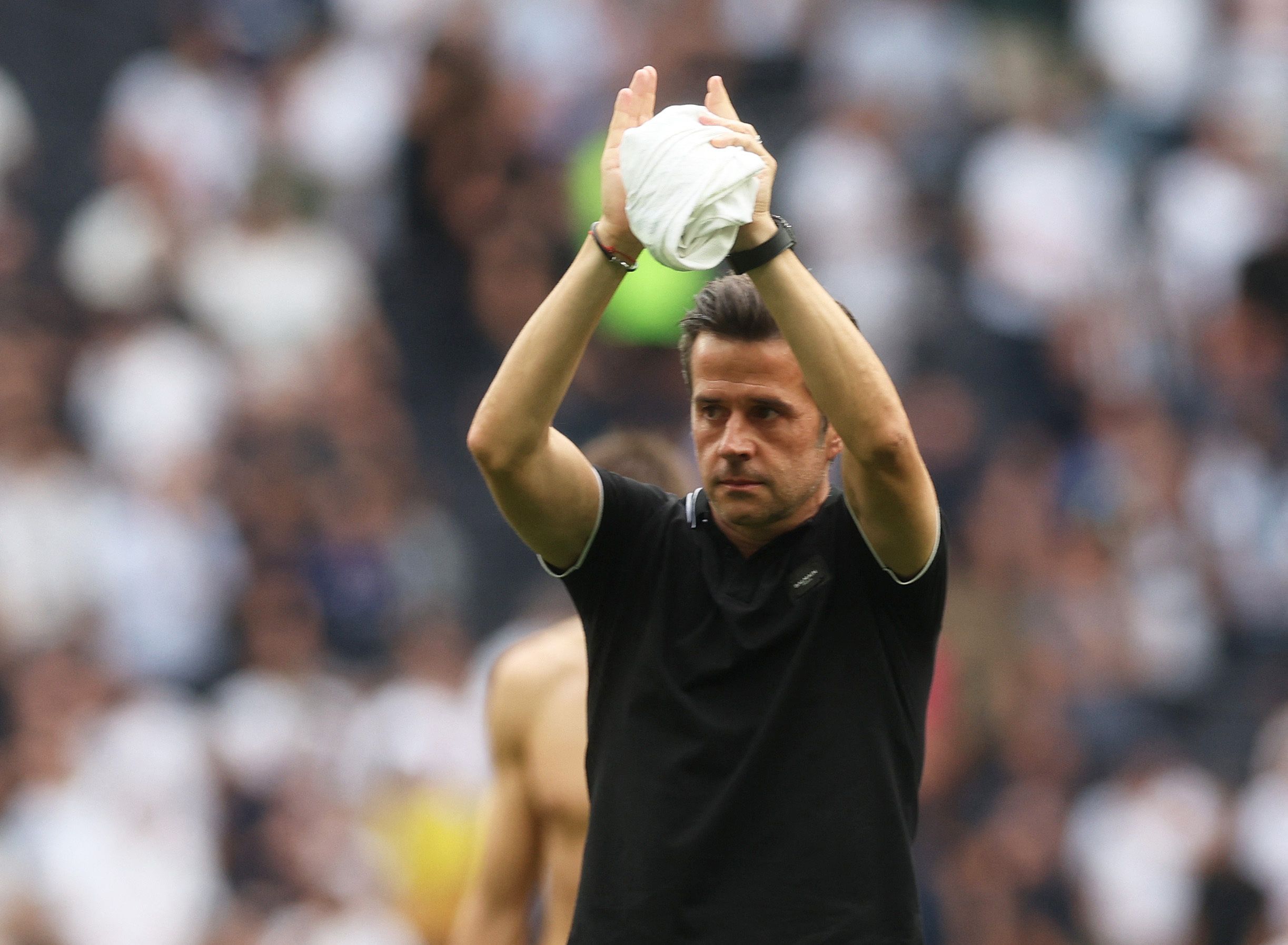 Soccer Football - Premier League - Tottenham Hotspur v Fulham - Tottenham Hotspur Stadium, London, Britain - September 3, 2022 Fulham manager Marco Silva applauds fans after the match Action Images via Reuters/Paul Childs EDITORIAL USE ONLY. No use with unauthorized audio, video, data, fixture lists, club/league logos or 'live' services. Online in-match use limited to 75 images, no video emulation. No use in betting, games or single club /league/player publications.  Please contact your account 