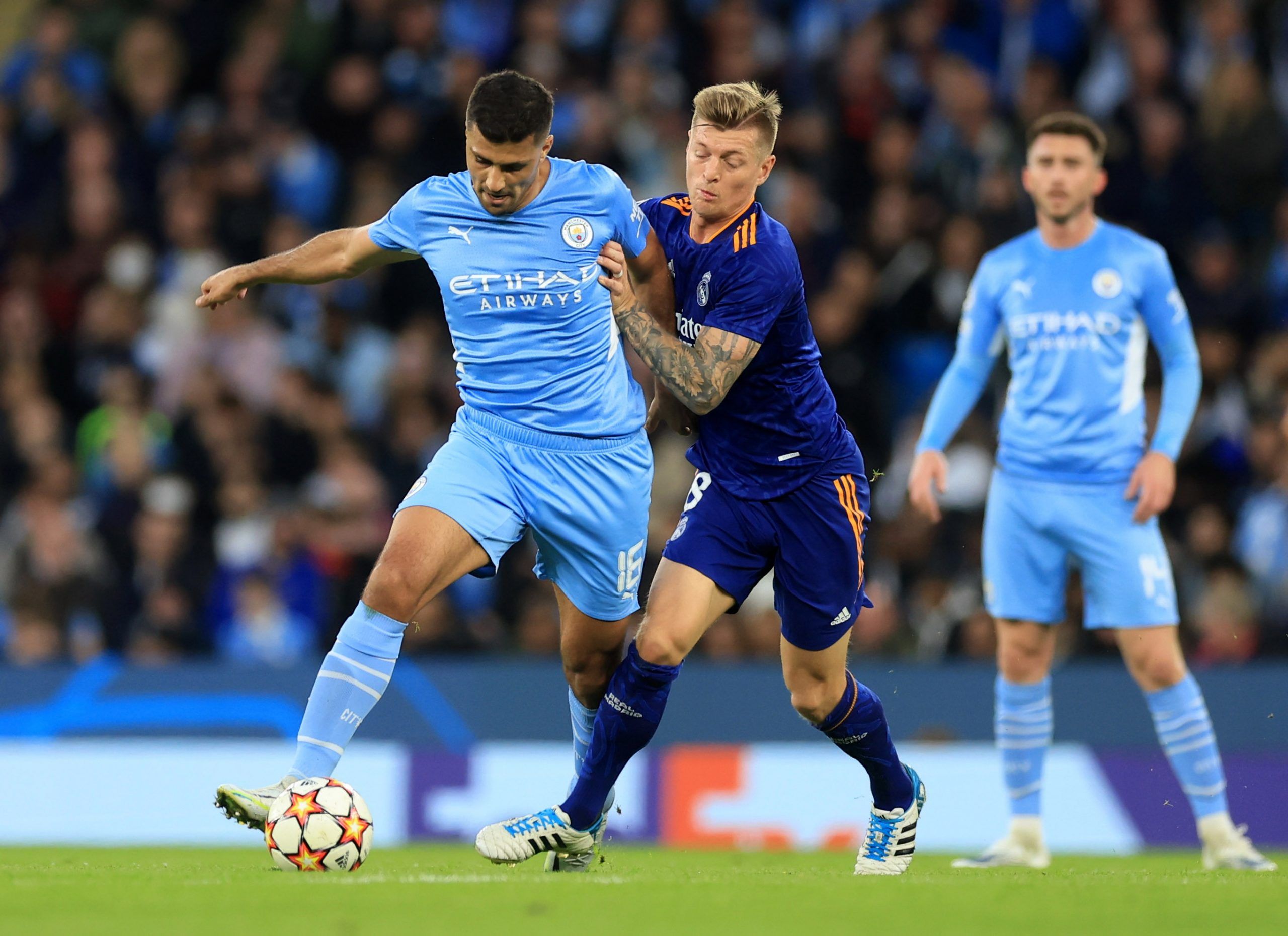 Soccer Football - Champions League - Semi Final - First Leg - Manchester City v Real Madrid - Etihad Stadium, Manchester, Britain - April 26, 2022 Manchester City's Rodri in action with Real Madrid's Toni Kroos Action Images via Reuters/Lee Smith
