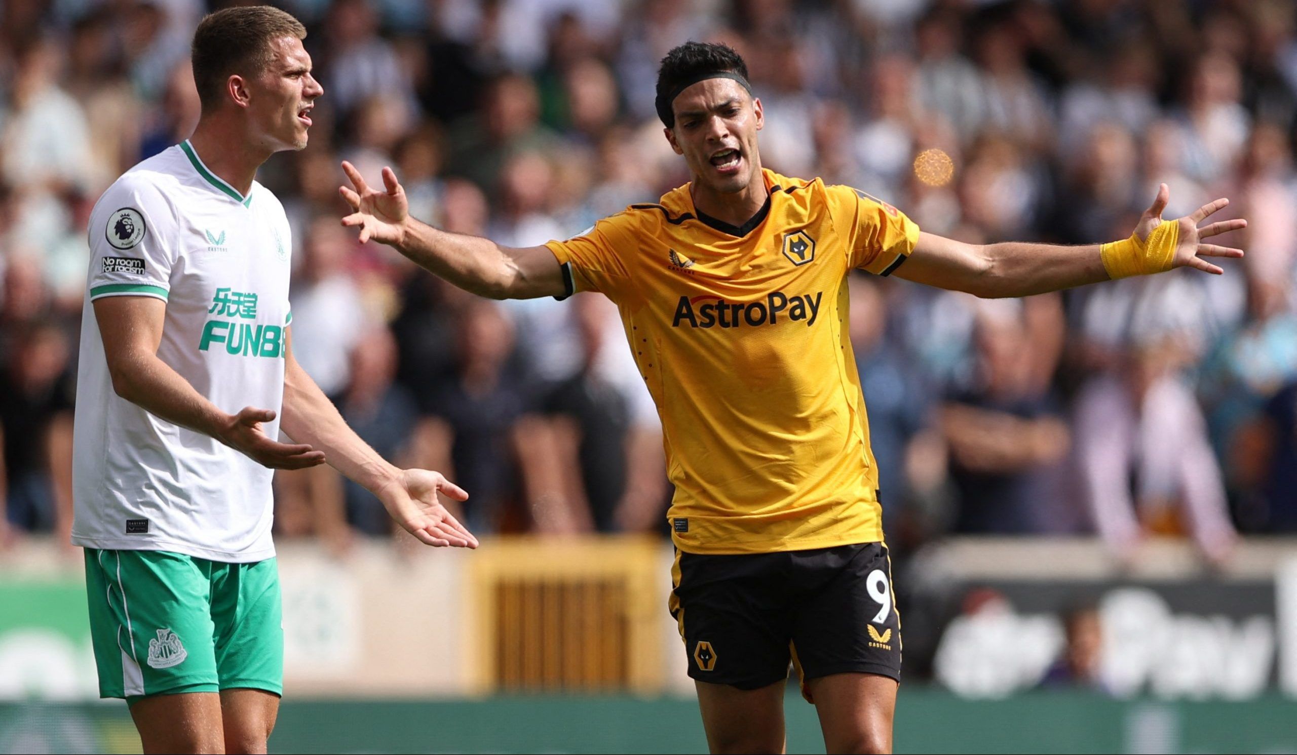 Soccer Football - Premier League - Wolverhampton Wanderers v Newcastle United - Molineux Stadium, Wolverhampton, Britain - August 28, 2022 Wolverhampton Wanderers' Raul Jimenez reacts after being fouled by Newcastle United's Sven Botman Action Images via Reuters/Molly Darlington EDITORIAL USE ONLY. No use with unauthorized audio, video, data, fixture lists, club/league logos or 'live' services. Online in-match use limited to 75 images, no video emulation. No use in betting, games or single club 
