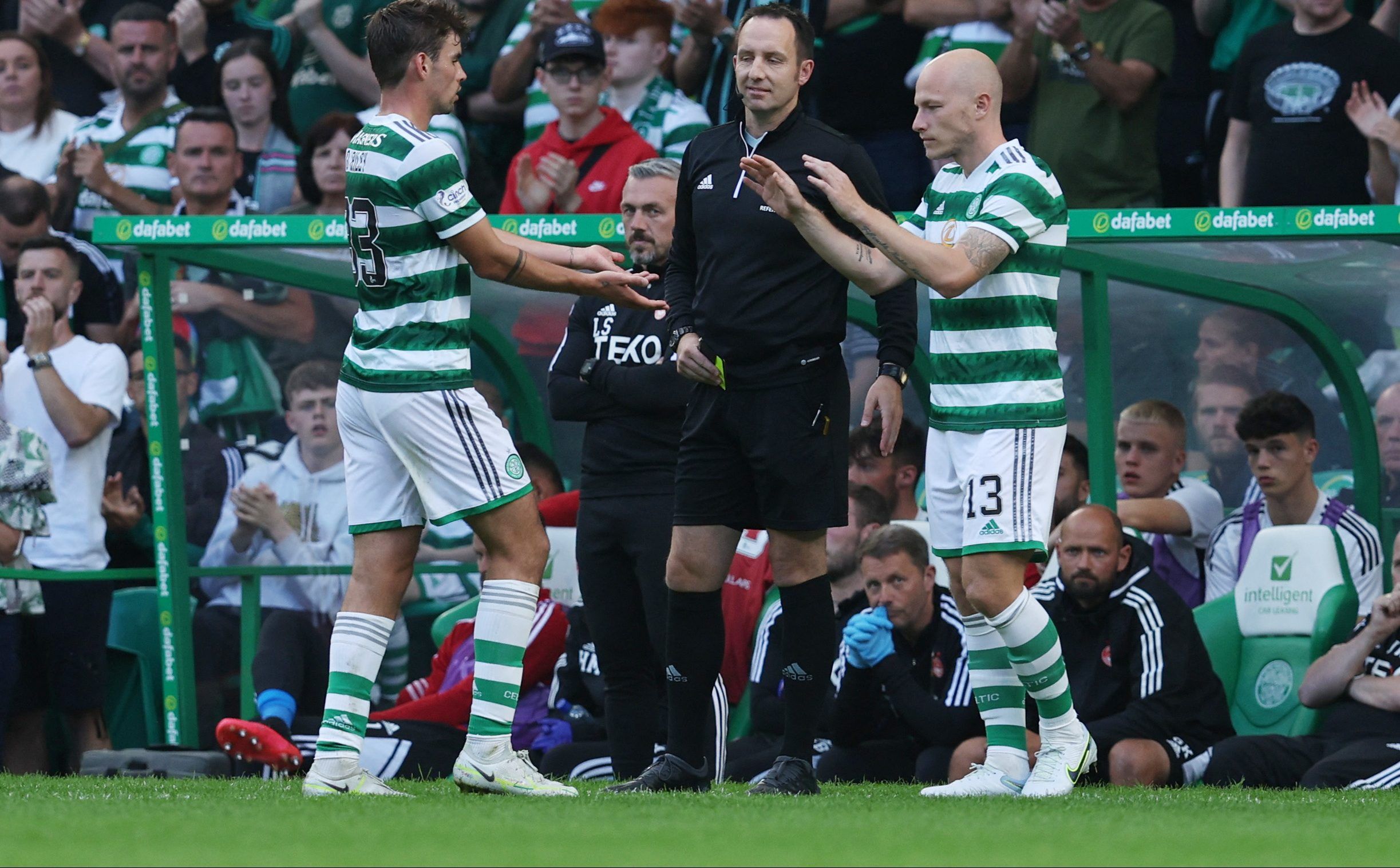 Soccer Football - Scottish Premiership - Celtic v Aberdeen - Celtic Park, Glasgow, Scotland, Britain - July 31, 2022 Celtic's Aaron Mooy comes on as a substitute to replace Celtic's Matt O'Riley REUTERS/Russell Cheyne