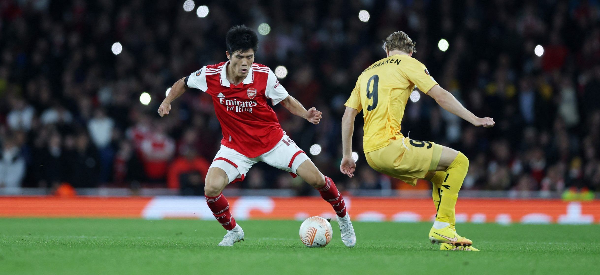Arsenal's Takehiro Tomiyasu in action with Bodo/Glimt's Ola Solbakken