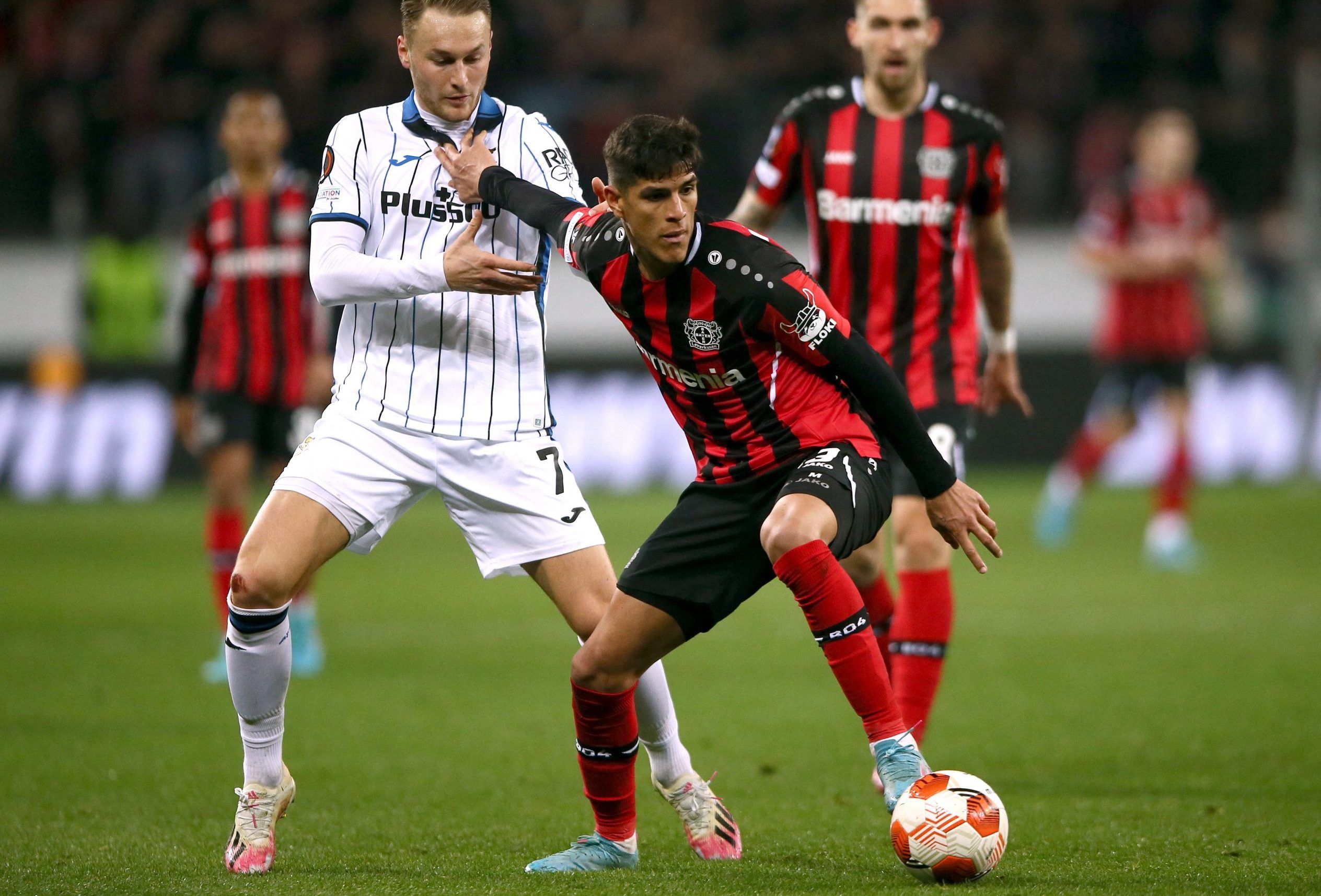 Bayer Leverkusen's Piero Hincapie in action with Atalanta's Teun Koopmeiners