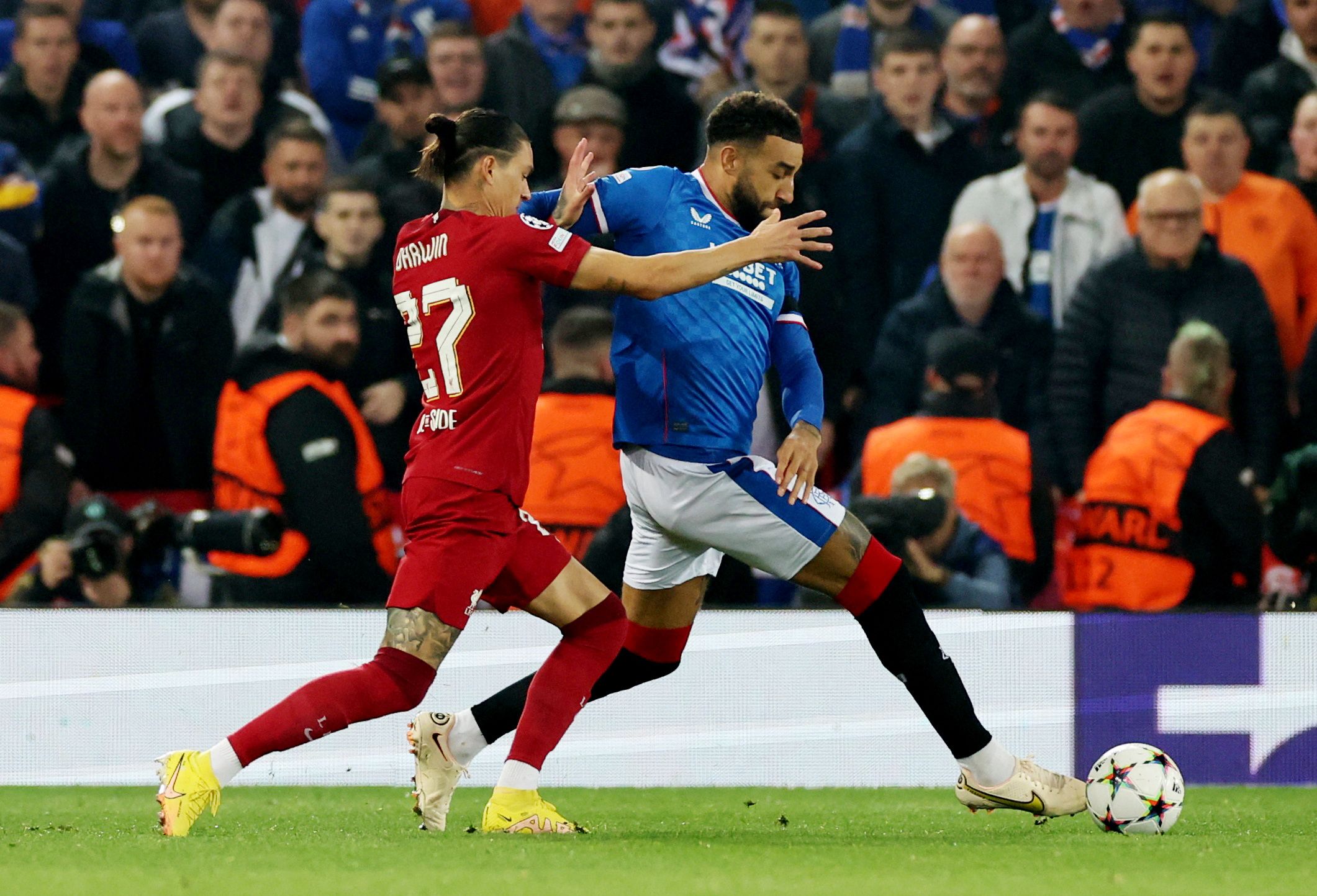 Soccer Football - Champions League - Group A - Liverpool v Rangers - Anfield, Liverpool, Britain - October 4, 2022  Liverpool's Darwin Nunez in action with Rangers' Connor Goldson REUTERS/Phil Noble