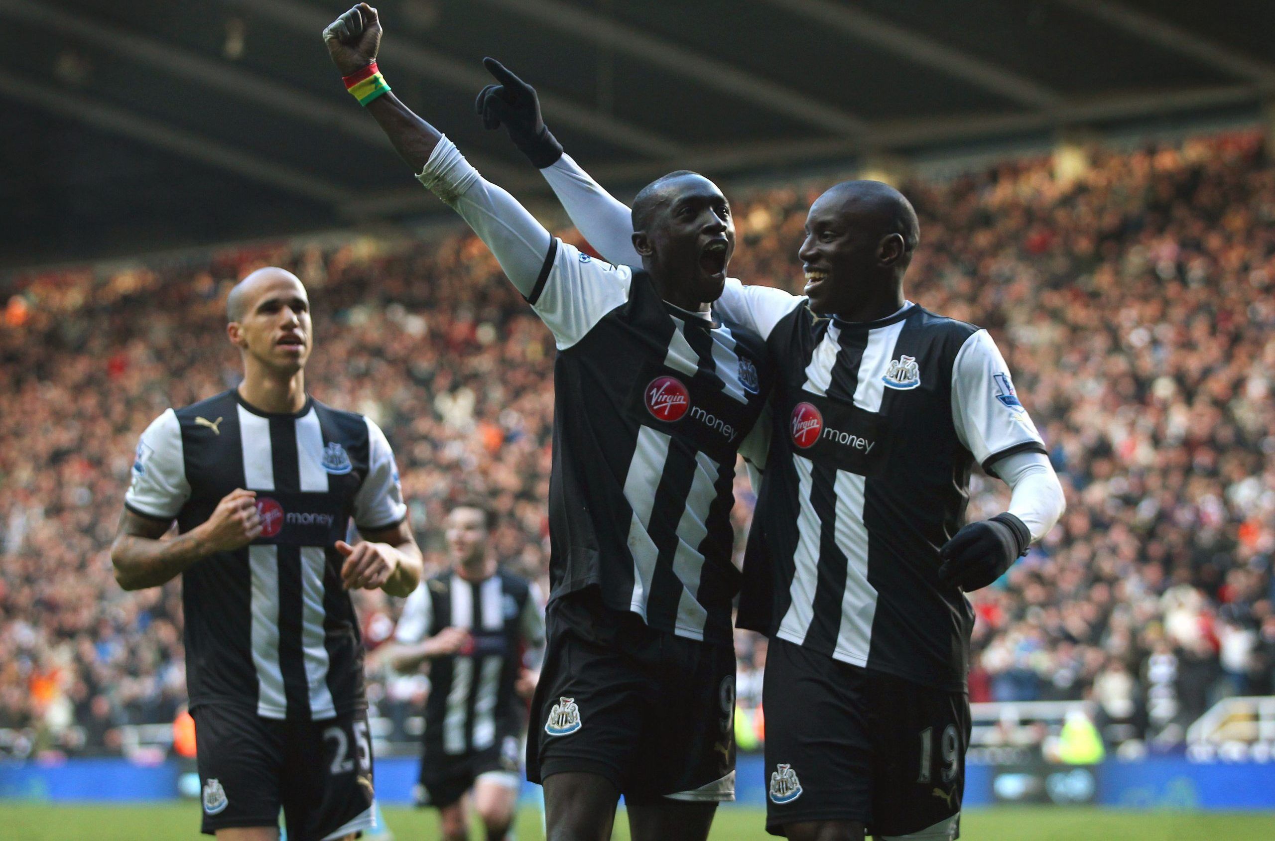 Football - Newcastle United v Aston Villa Barclays Premier League  - St James' Park - 5/2/12 
Papiss Cisse (L) celebrates with Demba Ba after scoring Newcastle's second goal 
Mandatory Credit: Action Images / Lee Smith 
Livepic 
EDITORIAL USE ONLY. No use with unauthorized audio, video, data, fixture lists, club/league logos or live services. Online in-match use limited to 45 images, no video emulation. No use in betting, games or single club/league/player publications.  Please contact your acco