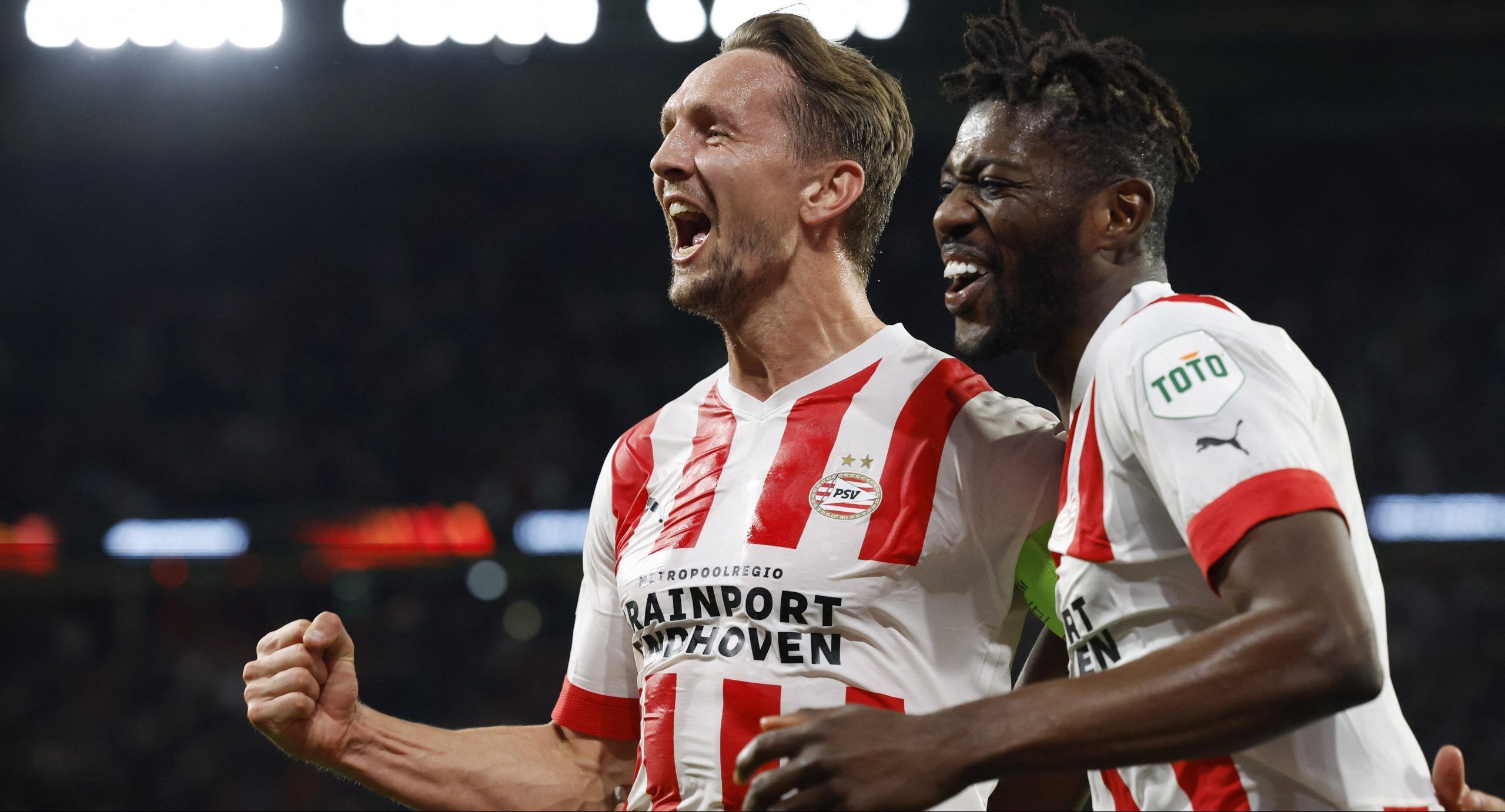 Soccer Football - Europa League - Group A - PSV Eindhoven v Arsenal - Philips Stadion, Eindhoven, Netherlands - October 27, 2022  PSV Eindhoven's Luuk de Jong celebrates scoring their second goal with Ibrahim Sangare REUTERS/Piroschka Van De Wouw