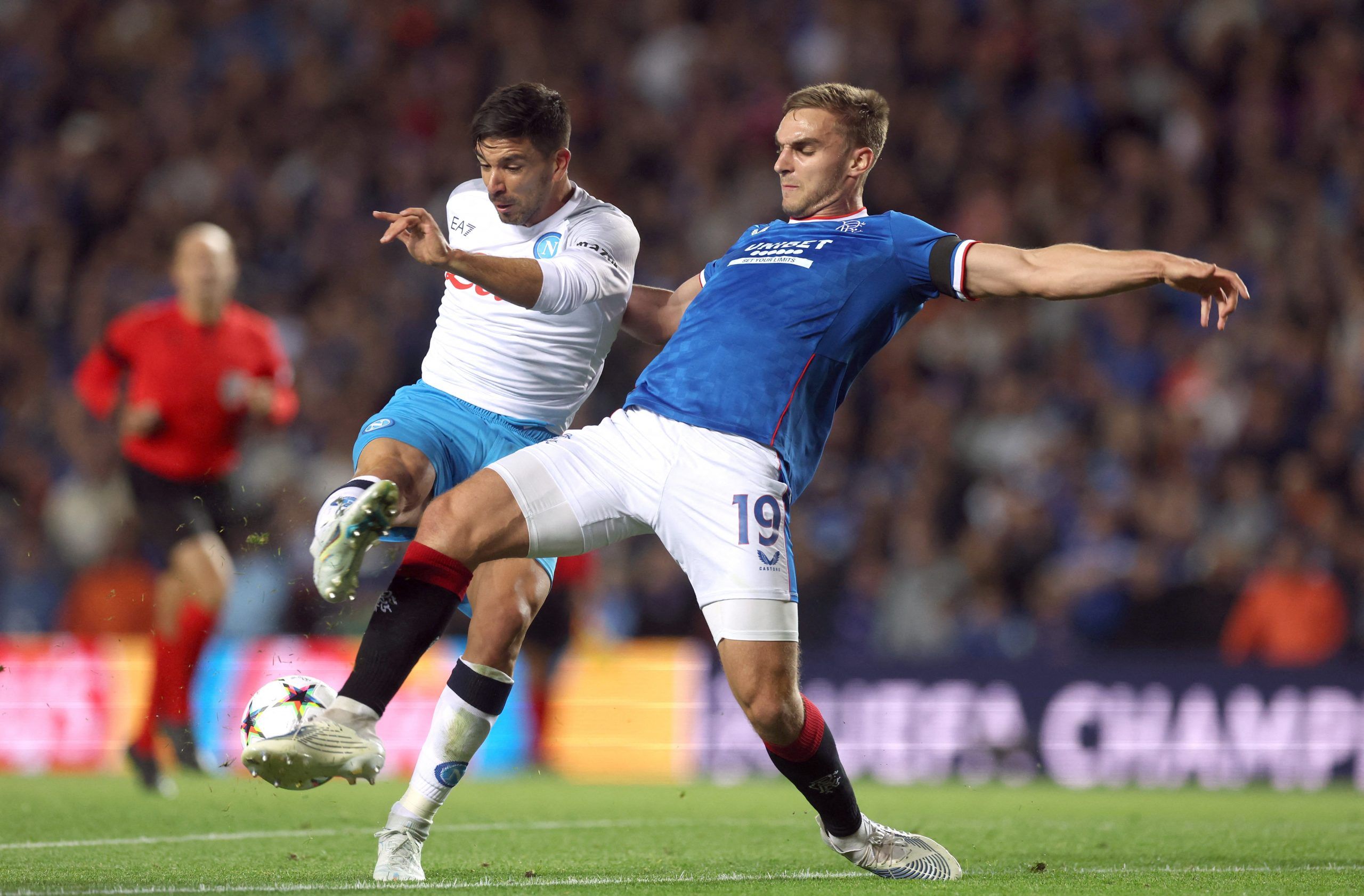 Soccer Football - Champions League - Group A - Rangers v Napoli - Ibrox, Glasgow, Scotland, Britain - September 14, 2022 Napoli's Giovanni Simeone in action with Rangers' James Sands Action Images via Reuters/Lee Smith