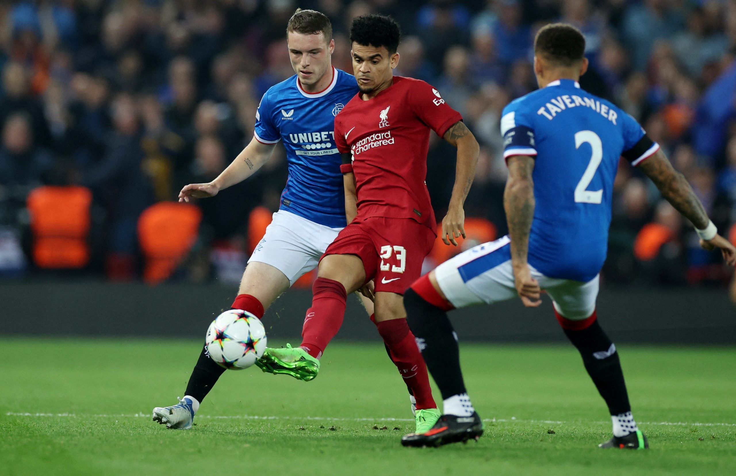 Soccer Football - Champions League - Group A - Liverpool v Rangers - Anfield, Liverpool, Britain - October 4, 2022  Liverpool's Luis Diaz in action with Rangers' Leon Thomson King and James Tavernier REUTERS/Phil Noble