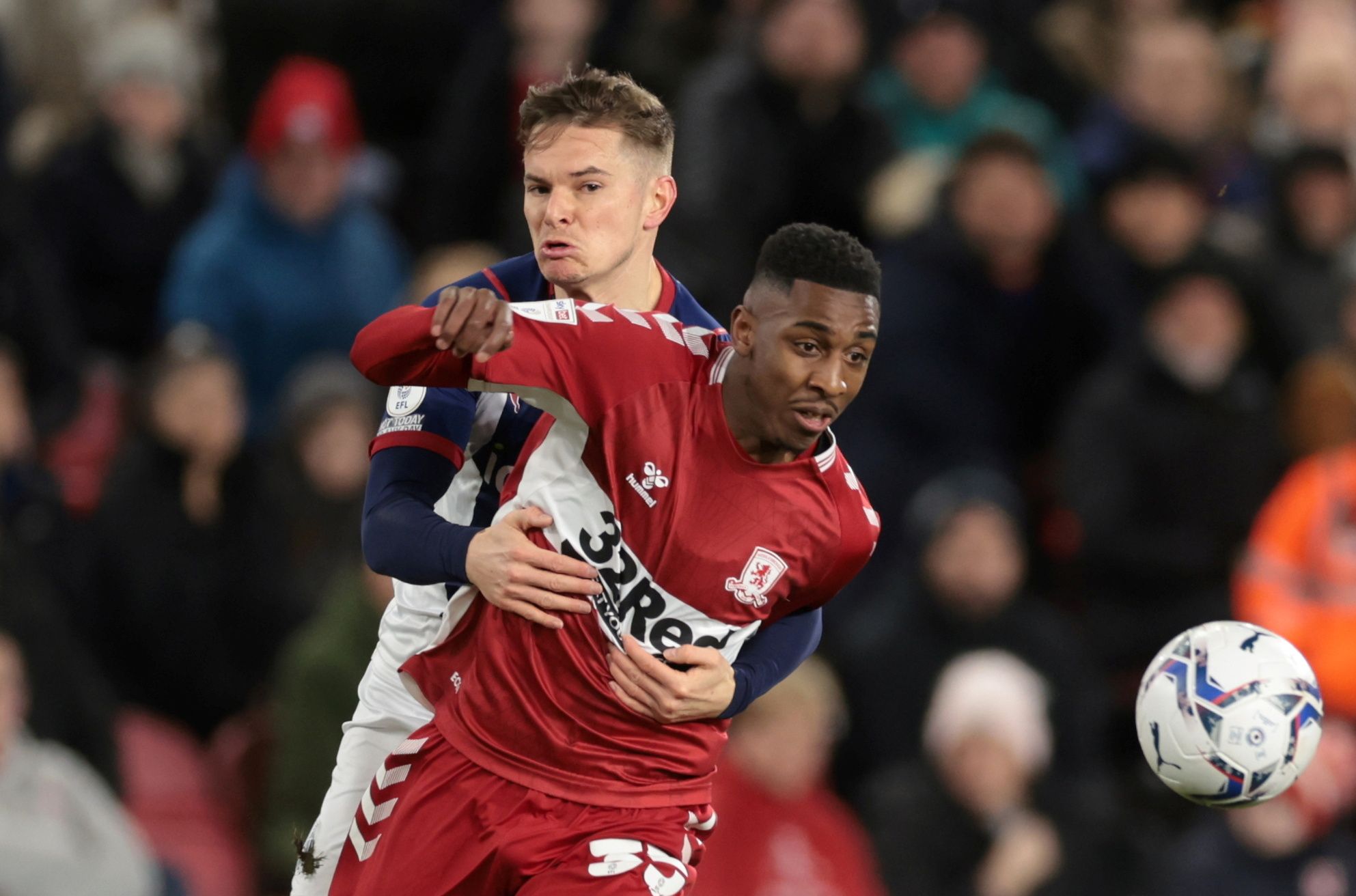 Soccer Football - Championship - Middlesbrough v West Bromwich Albion - Riverside Stadium, Middlesbrough, Britain - February 22, 2022  West Bromwich Albion's Conor Townsend in action with Middlesbrough?s Isiah Jones  Action Images/Lee Smith