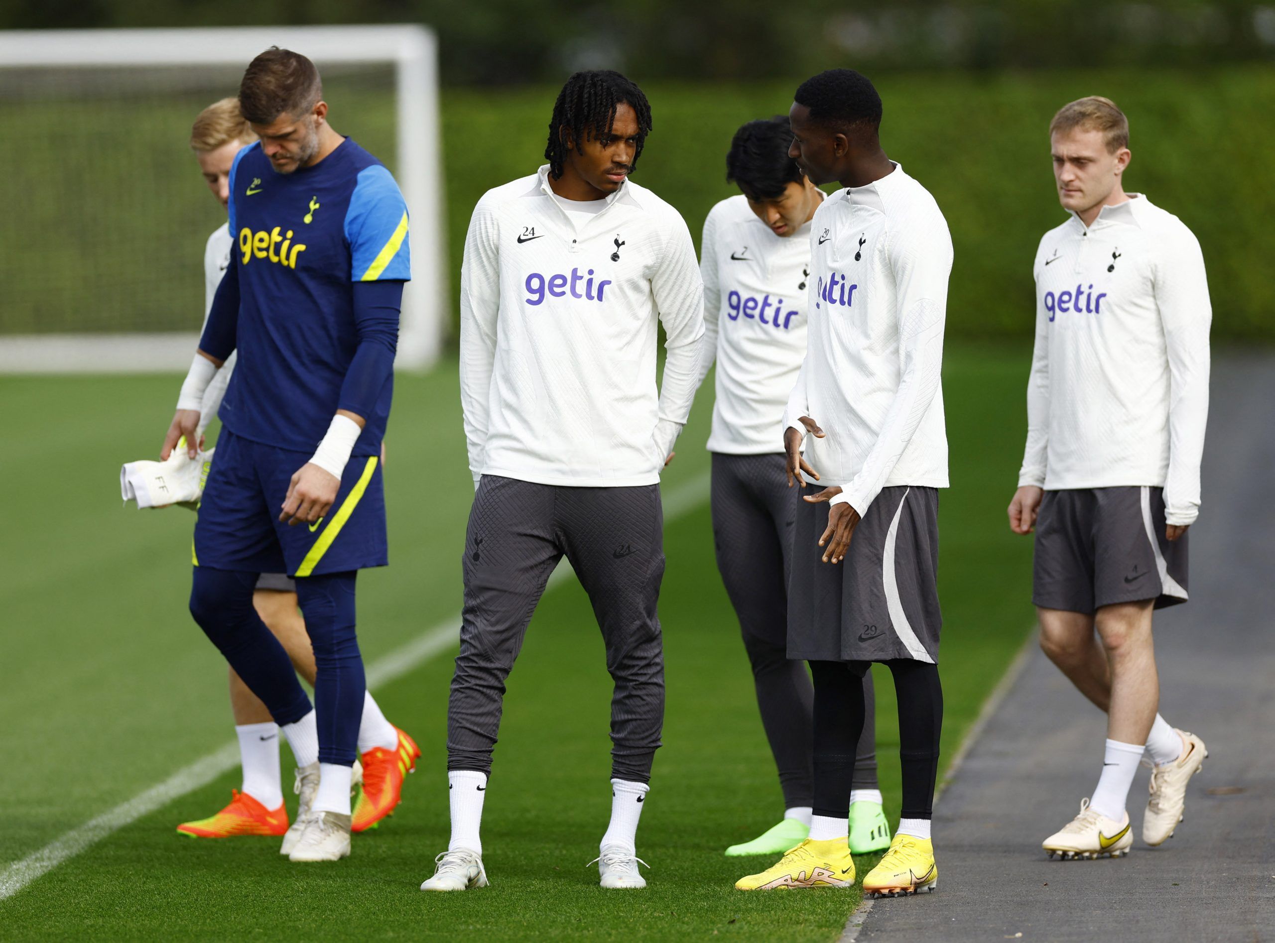 Tottenham Hotspur's Djed Spence and Pape Matar Sarr during training 
