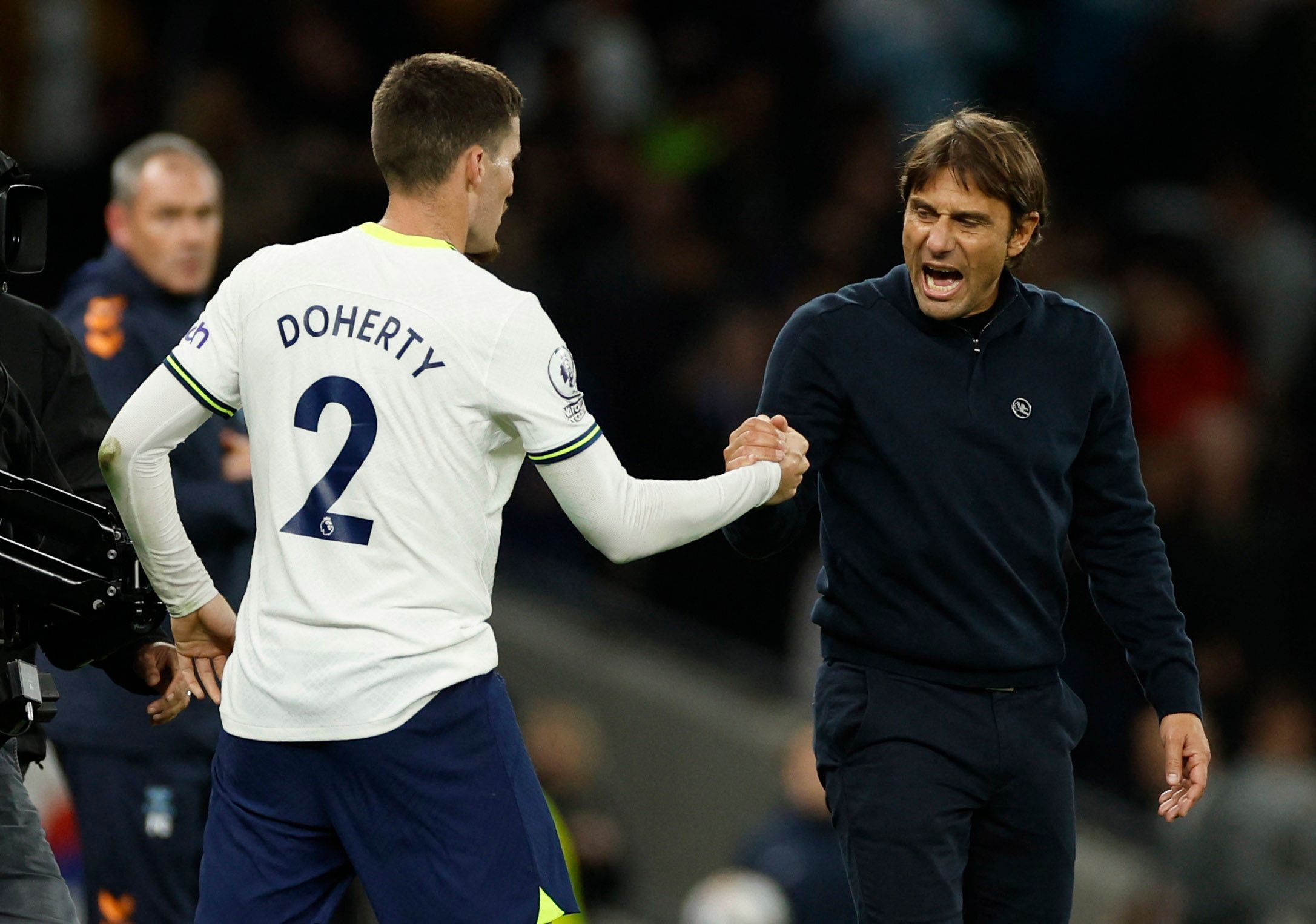 Tottenham Hotspur's Matt Doherty and manager Antonio Conte celebrate after the match 