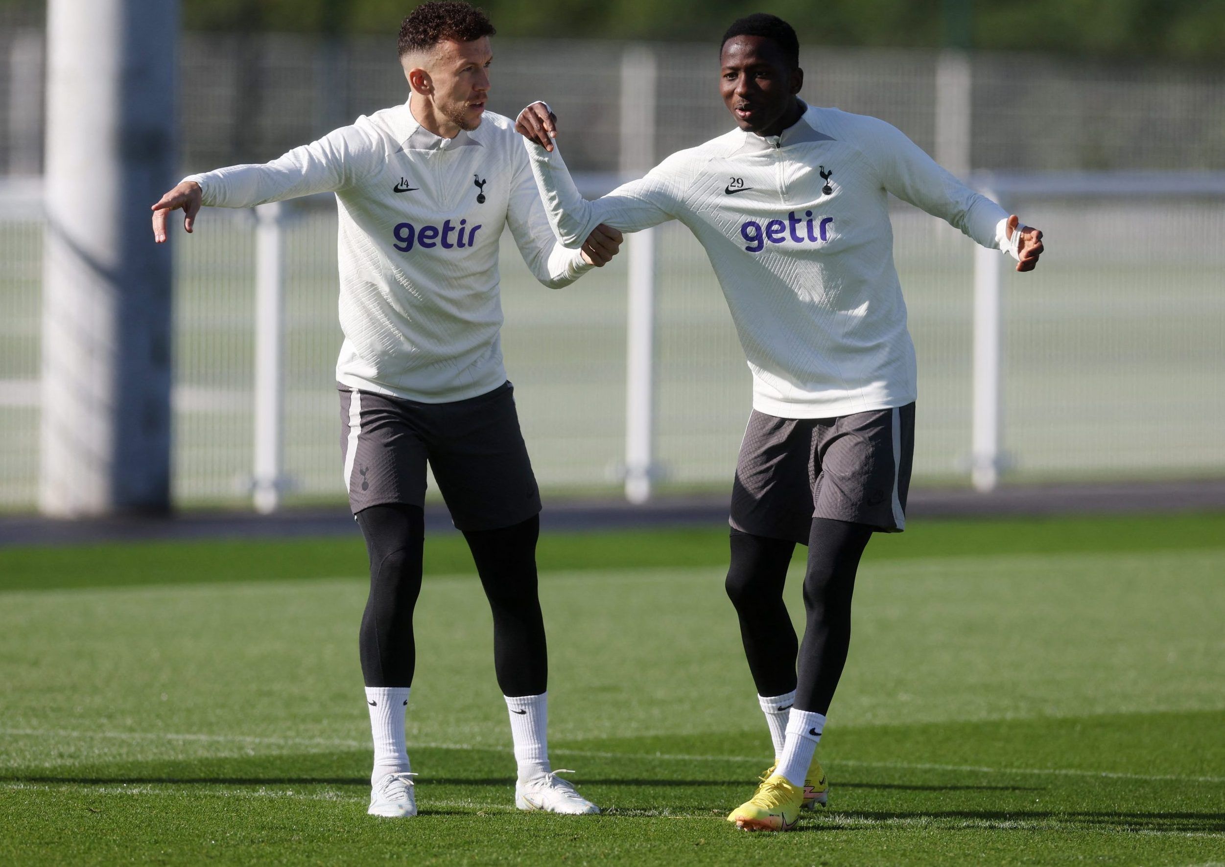 Tottenham Hotspur's Pape Matar Sarr and Ivan Perisic during training