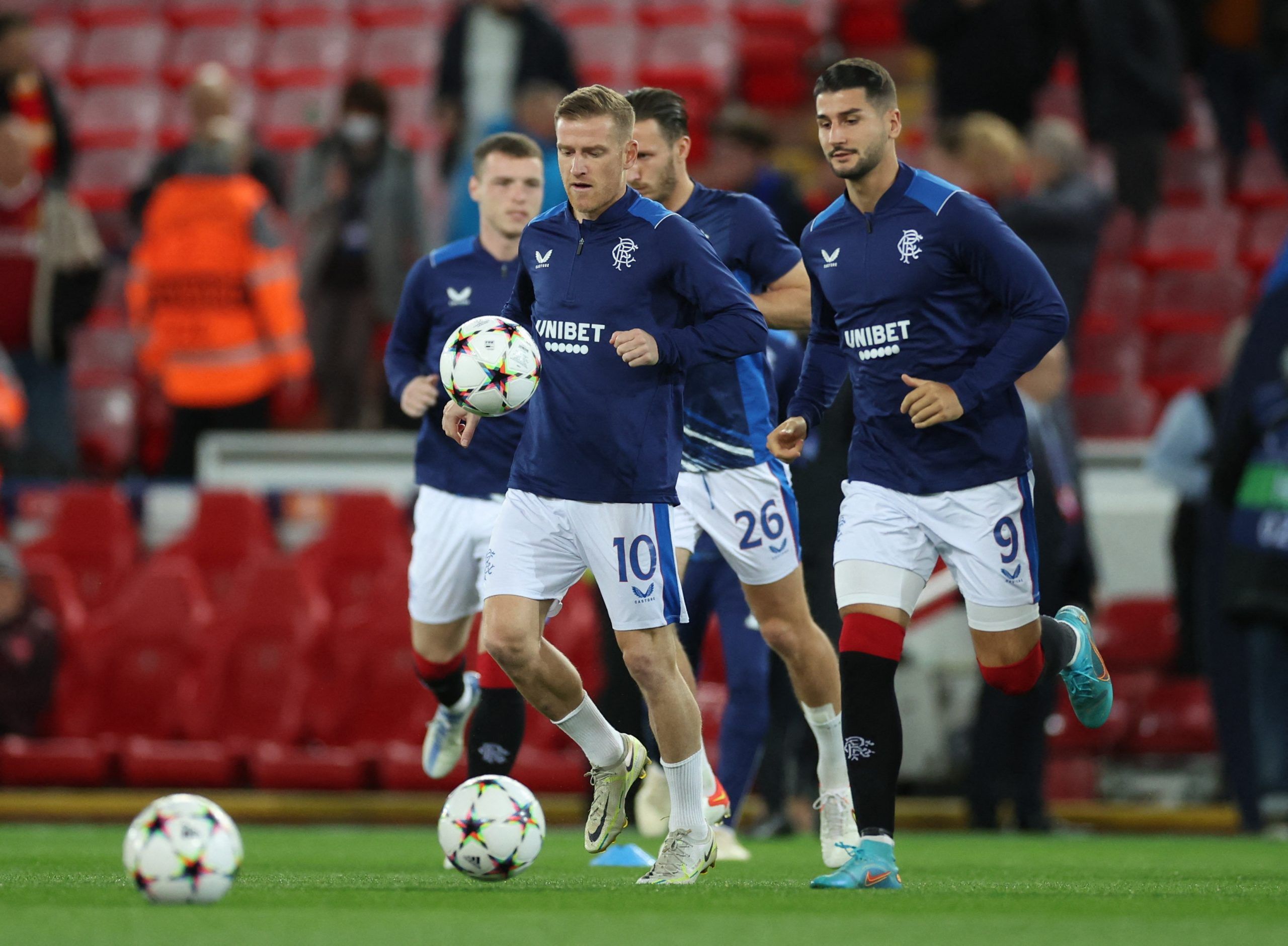 Soccer Football - Champions League - Group A - Liverpool v Rangers - Anfield, Liverpool, Britain - October 4, 2022   Rangers' Steven Davis, Ben Davies and Antonio-Mirko Colak during the warm up before the match Action Images via Reuters/Carl Recine