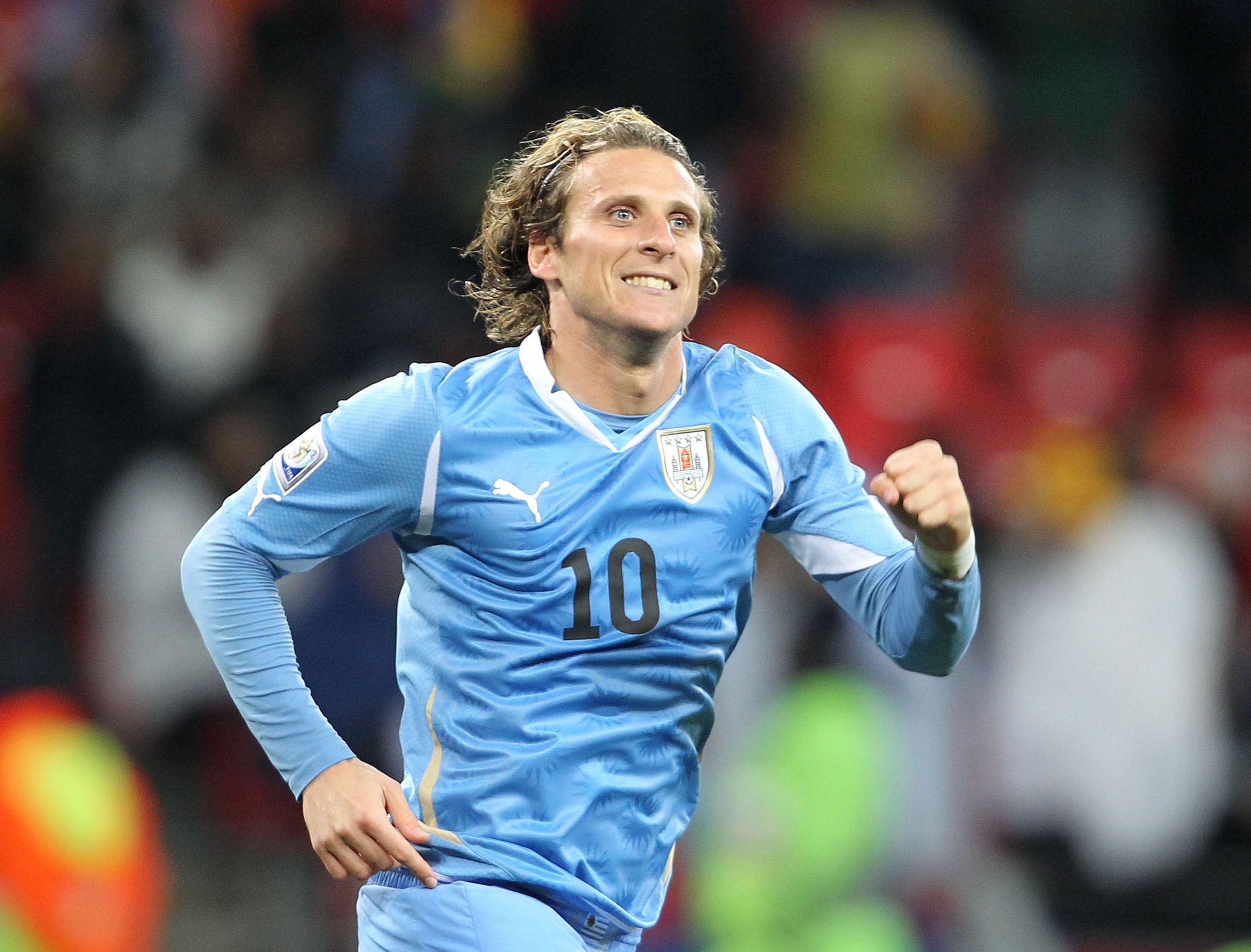 Football - Uruguay v Germany FIFA World Cup Third/Fourth Place Play-Off - South Africa 2010  - Nelson Mandela Bay Stadium, Port Elizabeth, South Africa - 10/7/10 
Uruguay's Diego Forlan celebrates scoring the second goal  
Mandatory Credit: Action Images / Matthew Childs 
Livepic