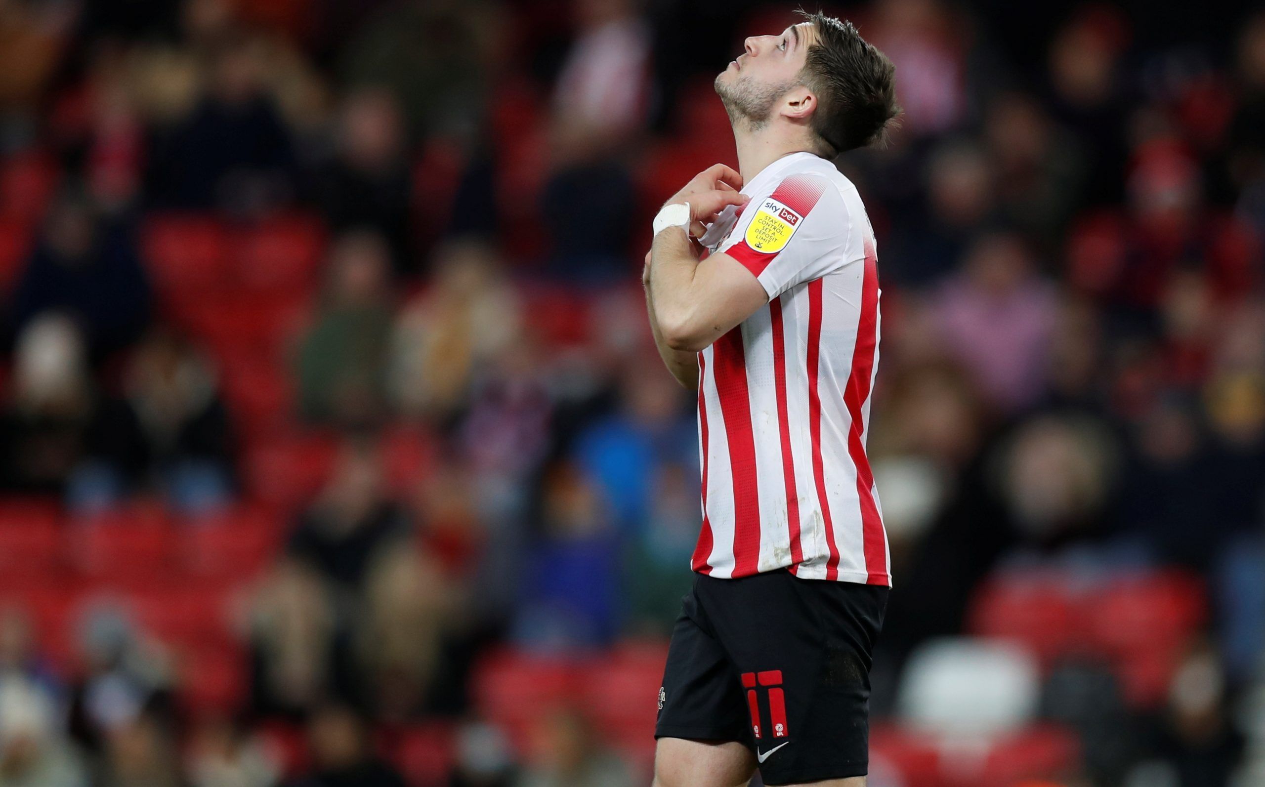 Soccer Football - EFL Trophy - Group Stage - Sunderland v Bradford City - Stadium of Light, Sunderland, Britain - November 9, 2021  Sunderland's Lynden Gooch reacts after missing penalty in shoot-out  Action Images/Lee Smith  EDITORIAL USE ONLY. No use with unauthorized audio, video, data, fixture lists, club/league logos or 