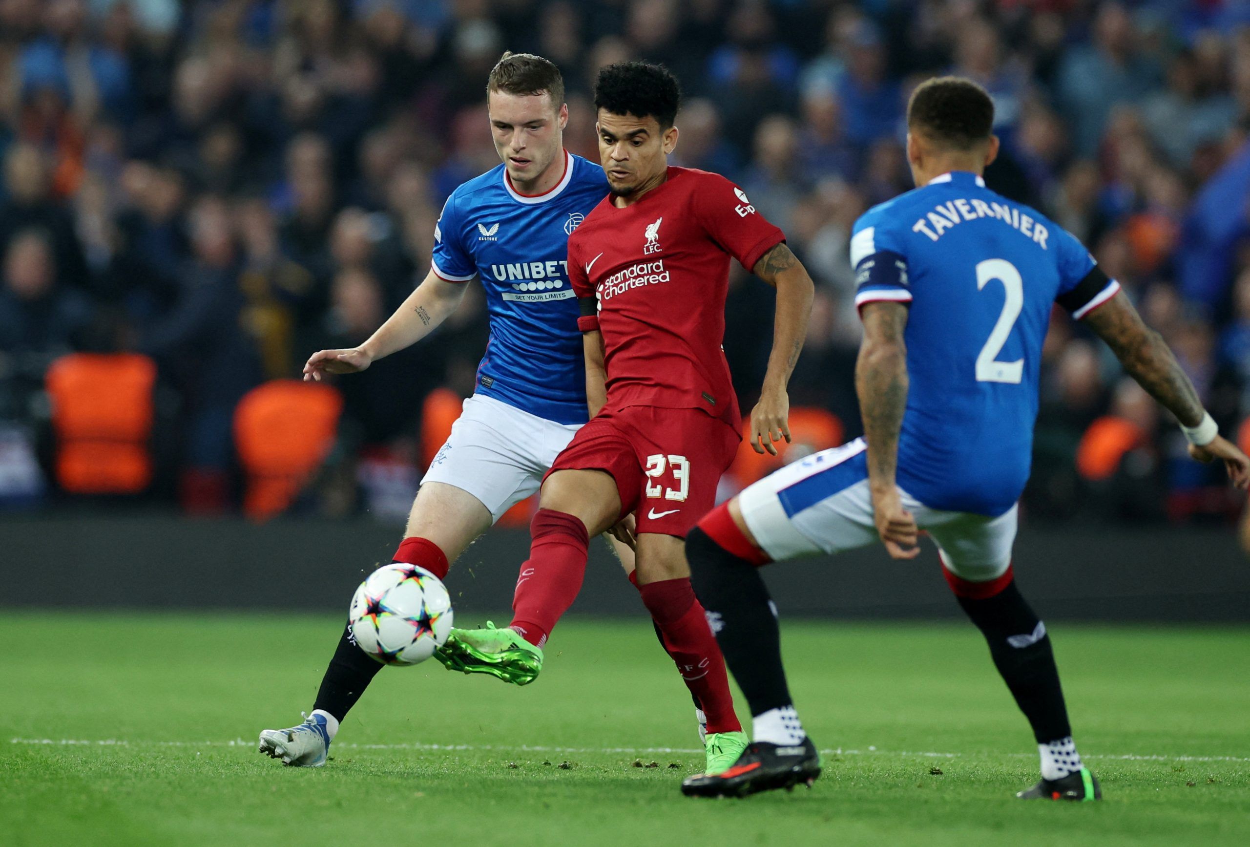 Soccer Football - Champions League - Group A - Liverpool v Rangers - Anfield, Liverpool, Britain - October 4, 2022 Liverpool's Luis Diaz in action with Rangers' Leon Thomson King and James Tavernier REUTERS/Phil Noble