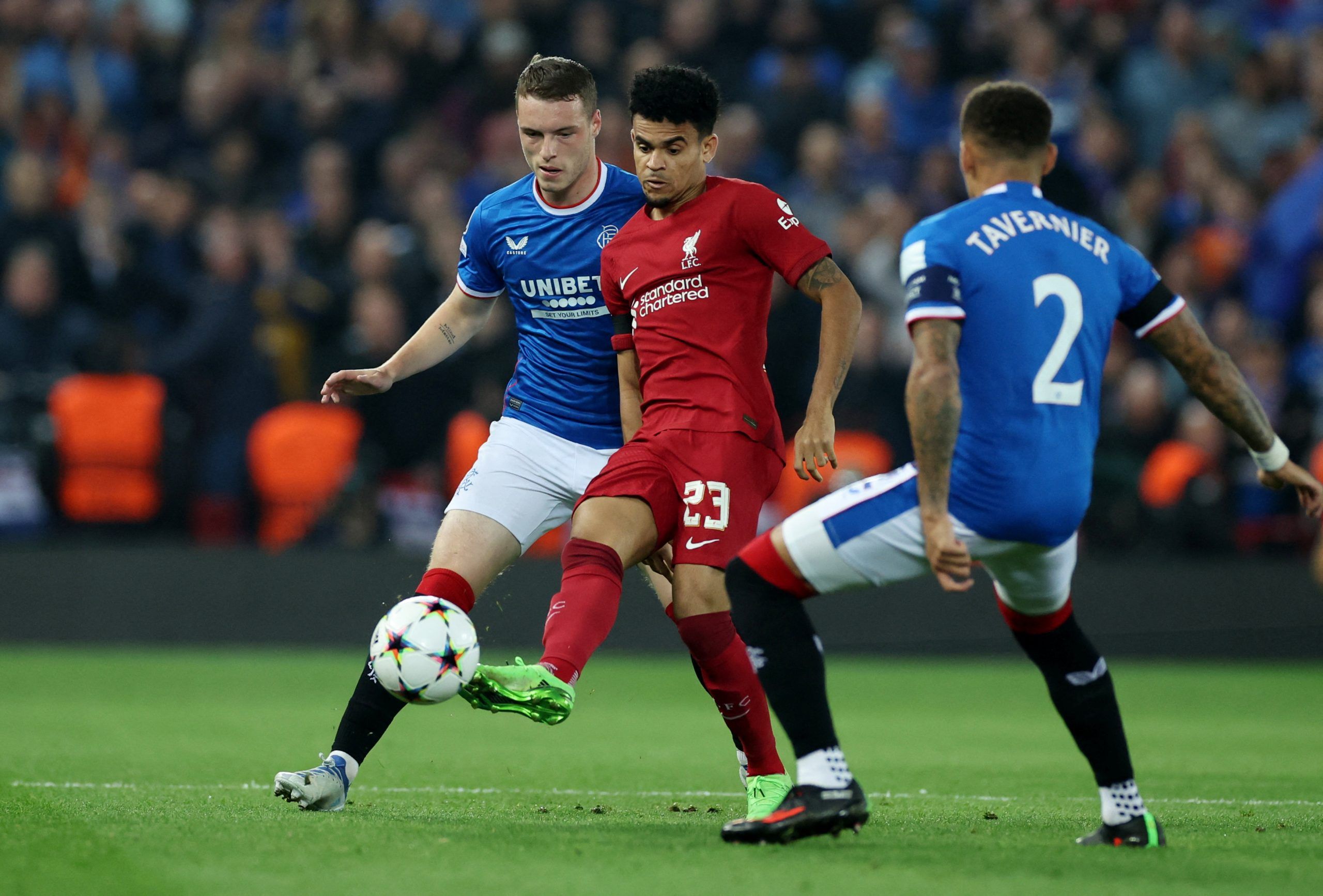 Soccer Football - Champions League - Group A - Liverpool v Rangers - Anfield, Liverpool, Britain - October 4, 2022  Liverpool's Luis Diaz in action with Rangers' Leon Thomson King and James Tavernier REUTERS/Phil Noble