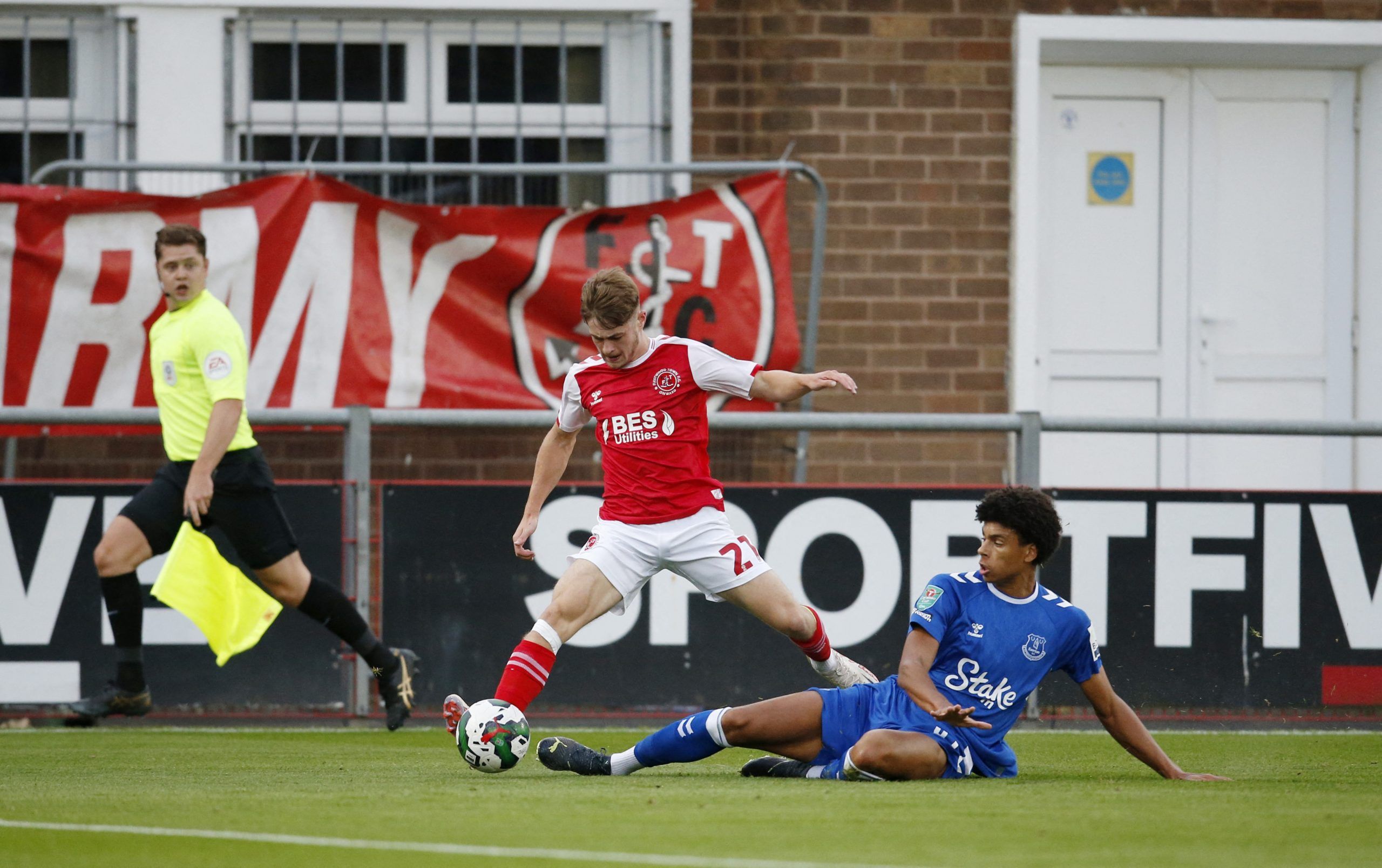 Soccer Football - Carabao Cup Second Round - Fleetwood Town v Everton - Highbury Stadium, Fleetwood, Britain - August 23, 2022 Fleetwood Town's Cian Hayes in action with Everton's Reece Welch Action Images via Reuters/Ed Sykes EDITORIAL USE ONLY. No use with unauthorized audio, video, data, fixture lists, club/league logos or 'live' services. Online in-match use limited to 75 images, no video emulation. No use in betting, games or single club /league/player publications.  Please contact your acc