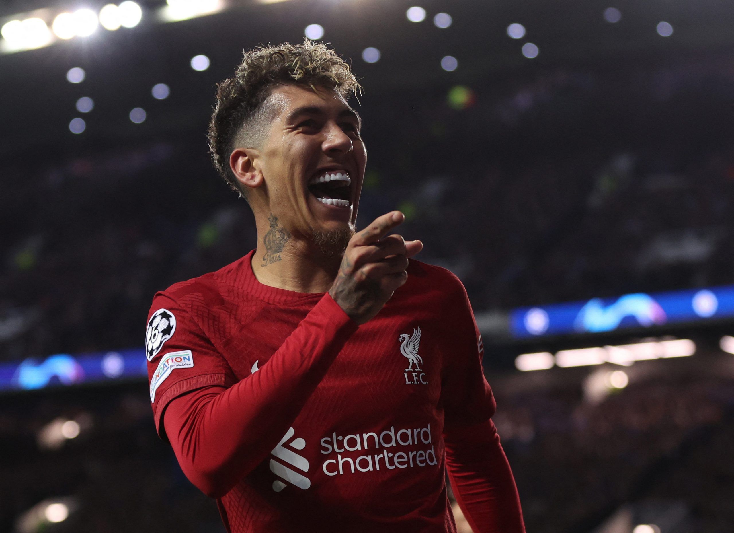 Soccer Football - Champions League - Group A - Rangers v Liverpool - Ibrox Stadium, Glasgow, Scotland, Britain - October 12, 2022  Liverpool's Roberto Firmino celebrates scoring their second goal Action Images via Reuters/Lee Smith
