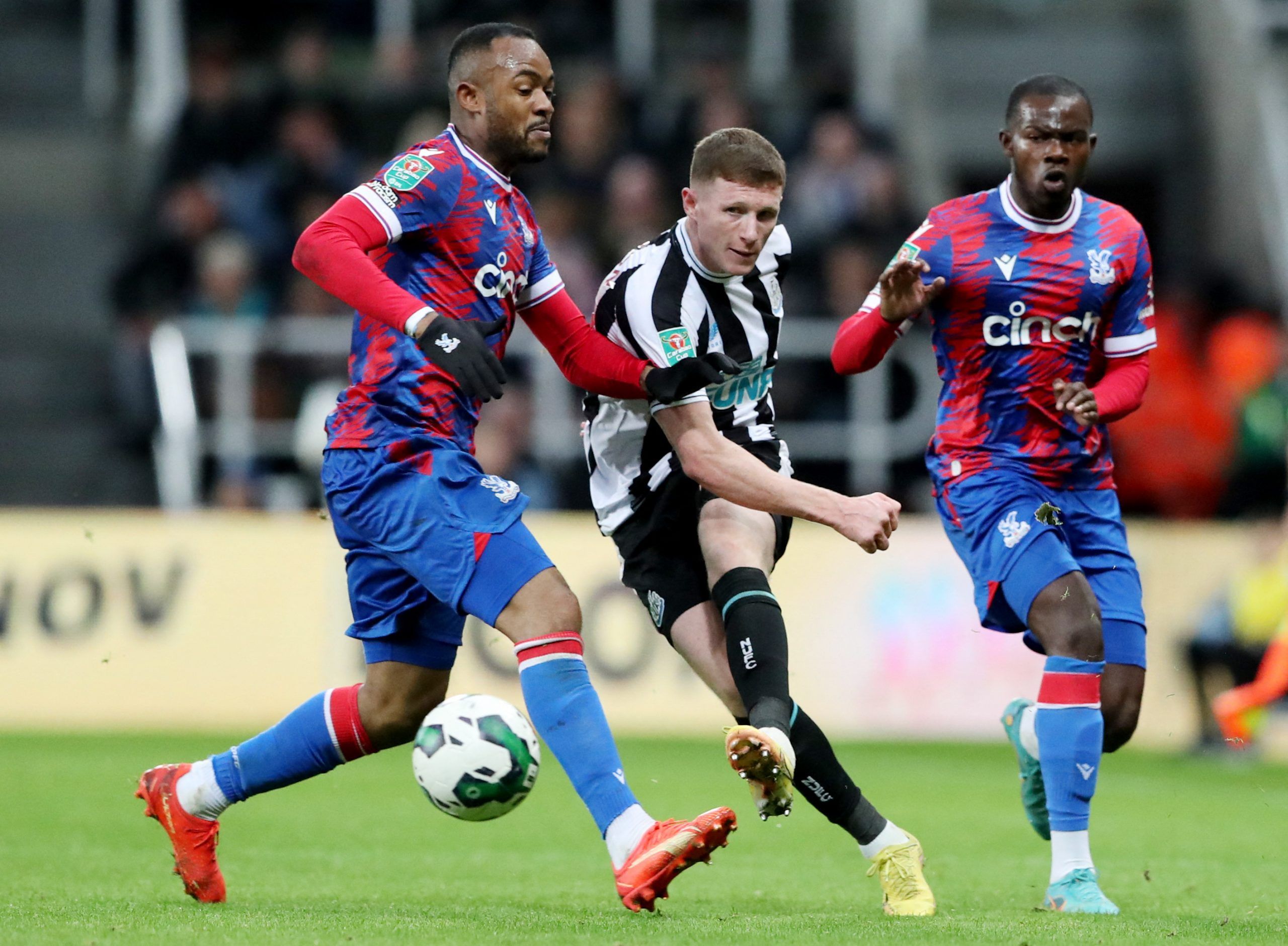 Soccer Football - Carabao Cup Third Round - Newcastle United v Crystal Palace - St James' Park, Newcastle, Britain - November 9, 2022 Crystal Palace's Jordan Ayew and Tyrick Mitchell in action with Newcastle United's Elliot Anderson REUTERS/Scott Heppell EDITORIAL USE ONLY. No use with unauthorized audio, video, data, fixture lists, club/league logos or 'live' services. Online in-match use limited to 75 images, no video emulation. No use in betting, games or single club /league/player publicatio