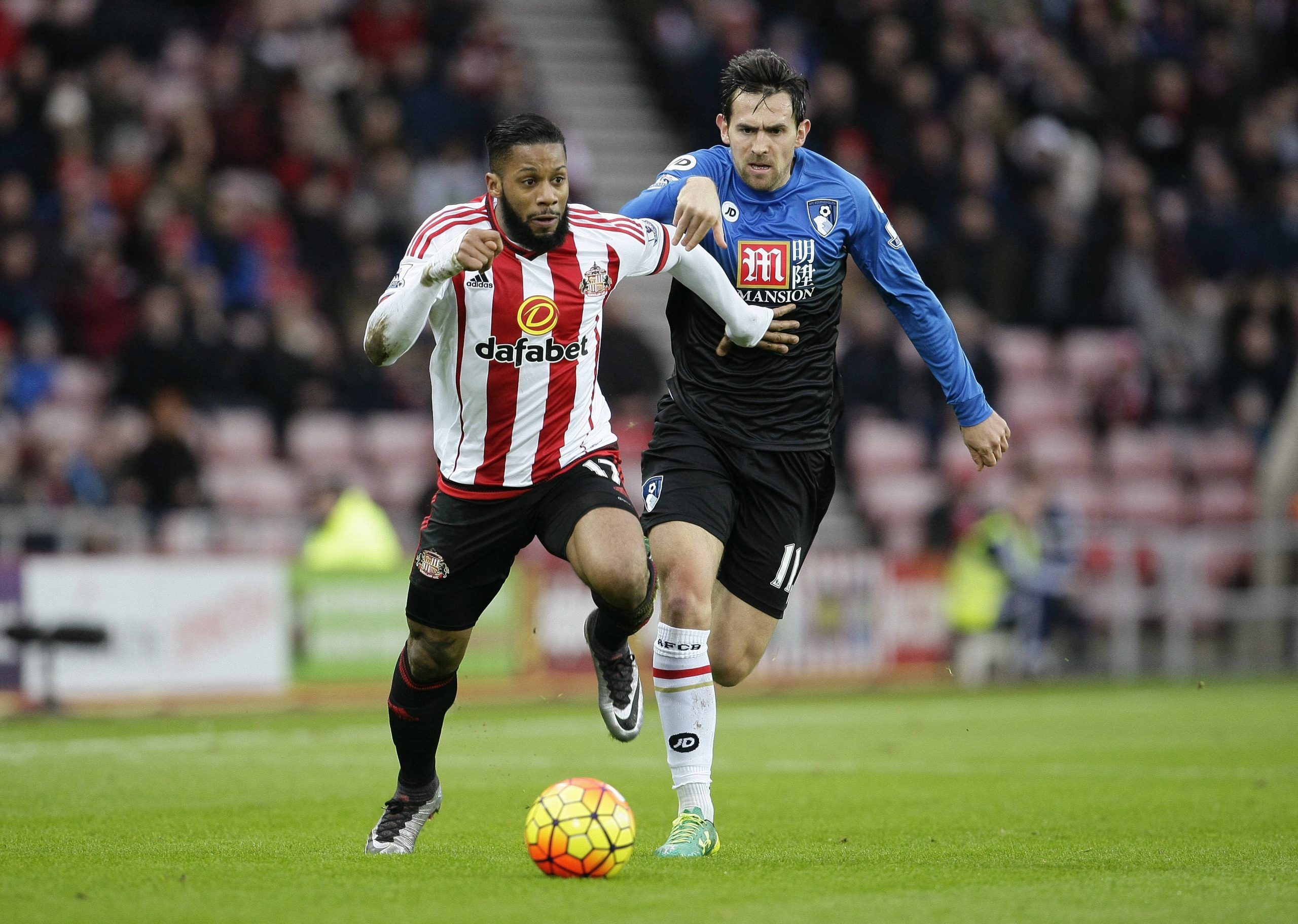 Football Soccer - Sunderland v AFC Bournemouth - Barclays Premier League - Stadium of Light - 23/1/16 
Sunderland's Jeremain Lens in action with Bournemouth's Charlie Daniels 
Action Images via Reuters / Craig Brough 
Livepic 
EDITORIAL USE ONLY. No use with unauthorized audio, video, data, fixture lists, club/league logos or 