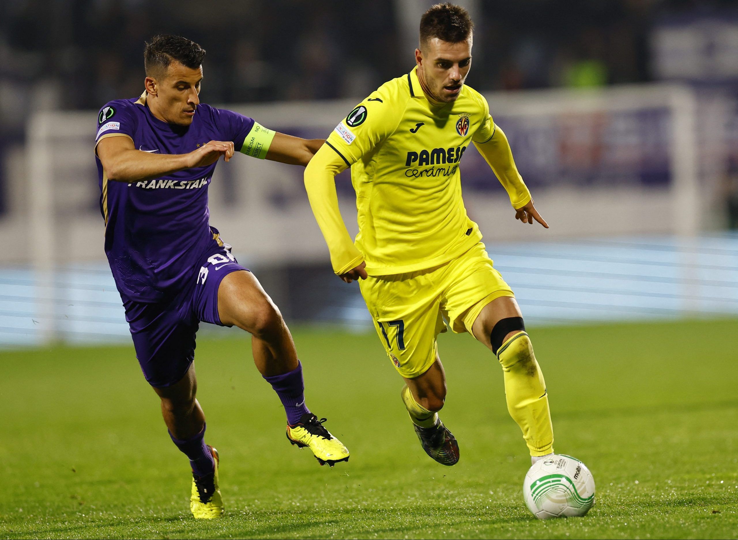 Soccer Football - Europa Conference League - Group C - FK Austria Wien v Villarreal - Generali Arena, Vienna, Austria - October 13, 2022 FK Austria Wien's Manfred Fischer in action with Villarreal's Giovani Lo Celso REUTERS/Lisa Leutner
