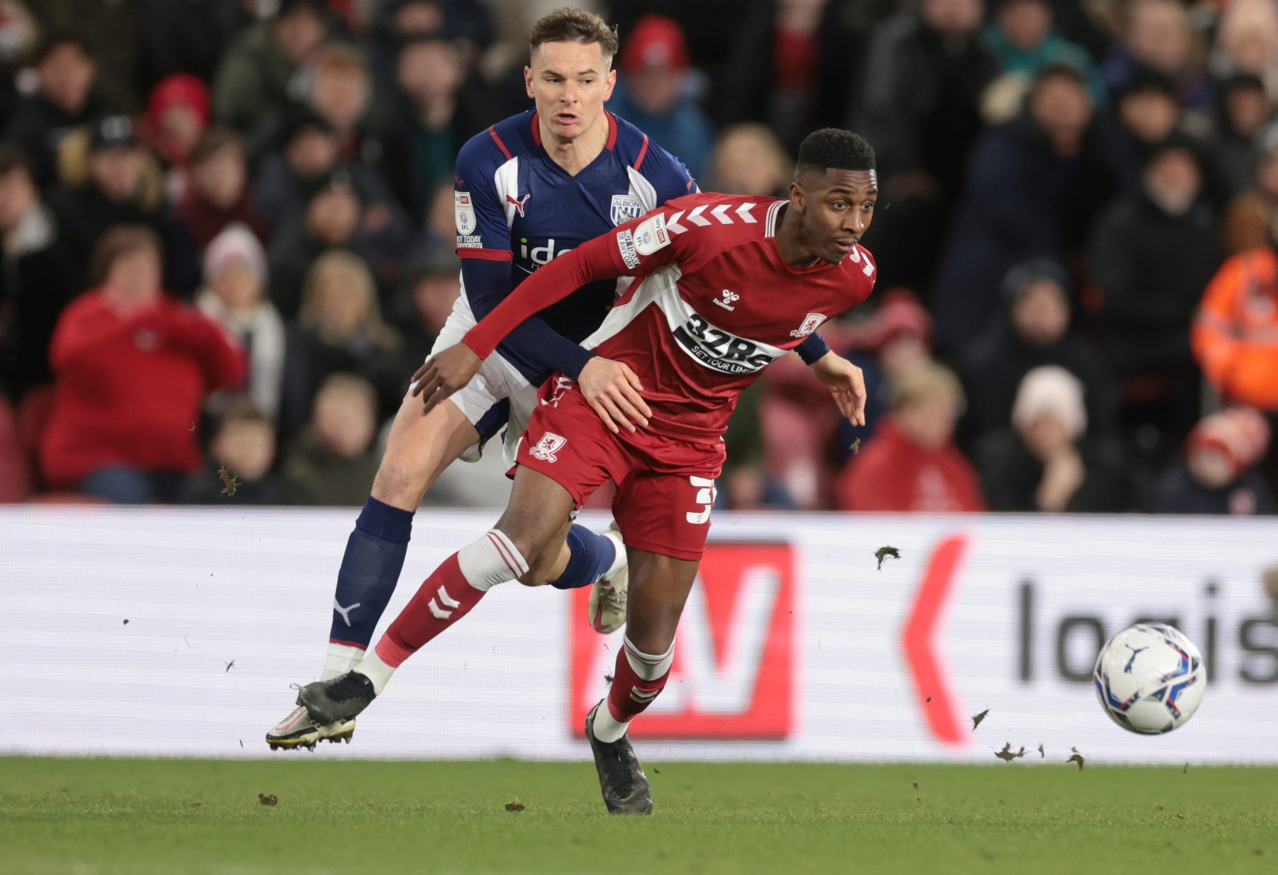 Soccer Football - Championship - Middlesbrough v West Bromwich Albion - Riverside Stadium, Middlesbrough, Britain - February 22, 2022  West Bromwich Albion's Conor Townsend in action with Middlesbrough?s Isiah Jones  Action Images/Lee Smith