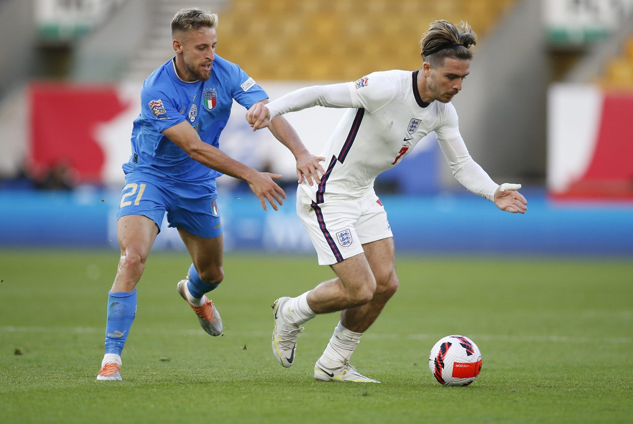 Italy's Davide Frattesi in action with England's Jack Grealish