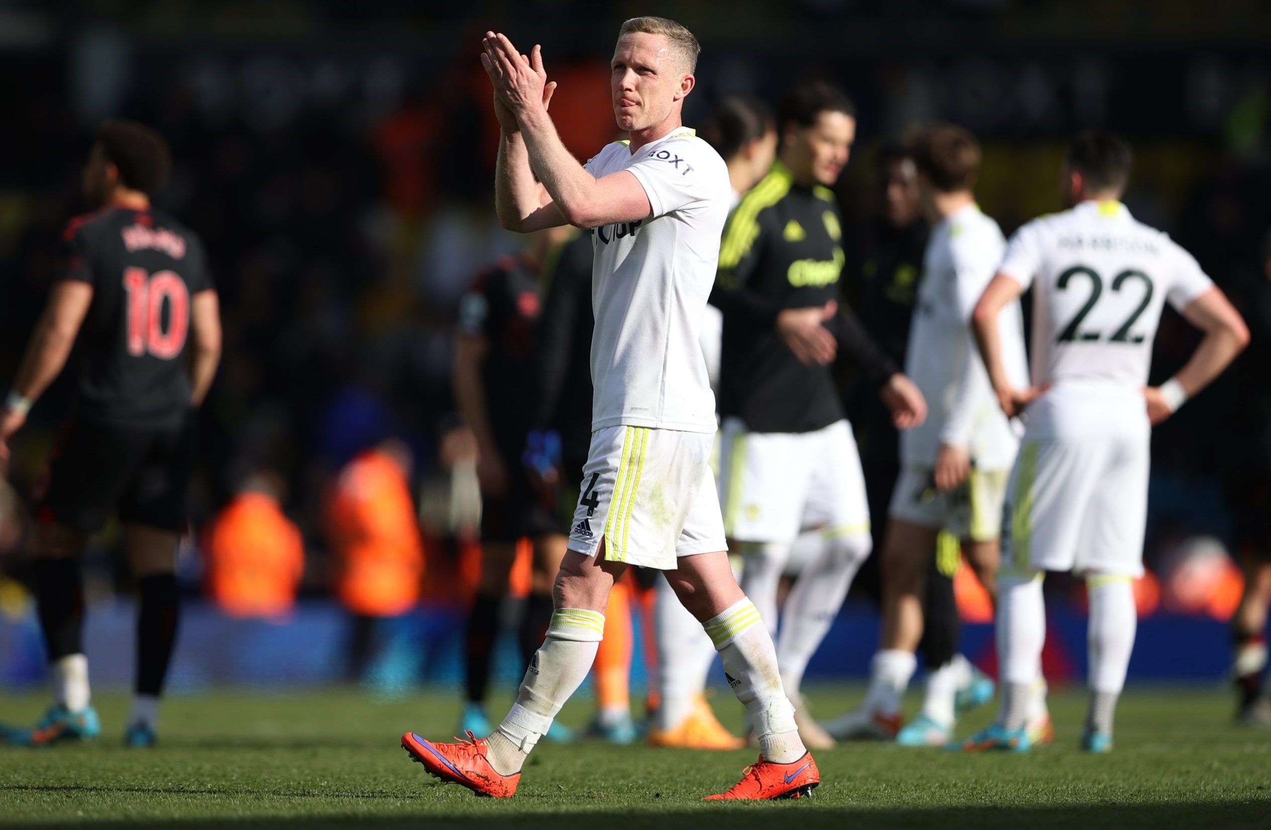 Leeds United's Adam Forshaw applauds fans after the match