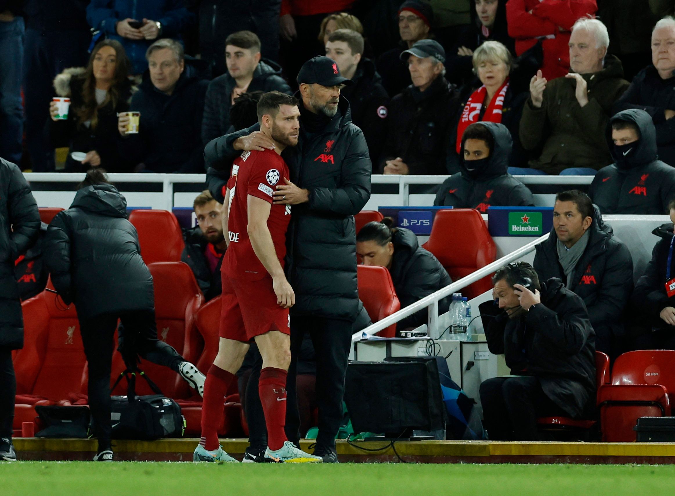 Soccer Football - Champions League - Group A - Liverpool v Napoli - Anfield, Liverpool, Britain - November 1, 2022 Liverpool's James Milner with manager Juergen Klopp after sustaining an injury Action Images via Reuters/Jason Cairnduff