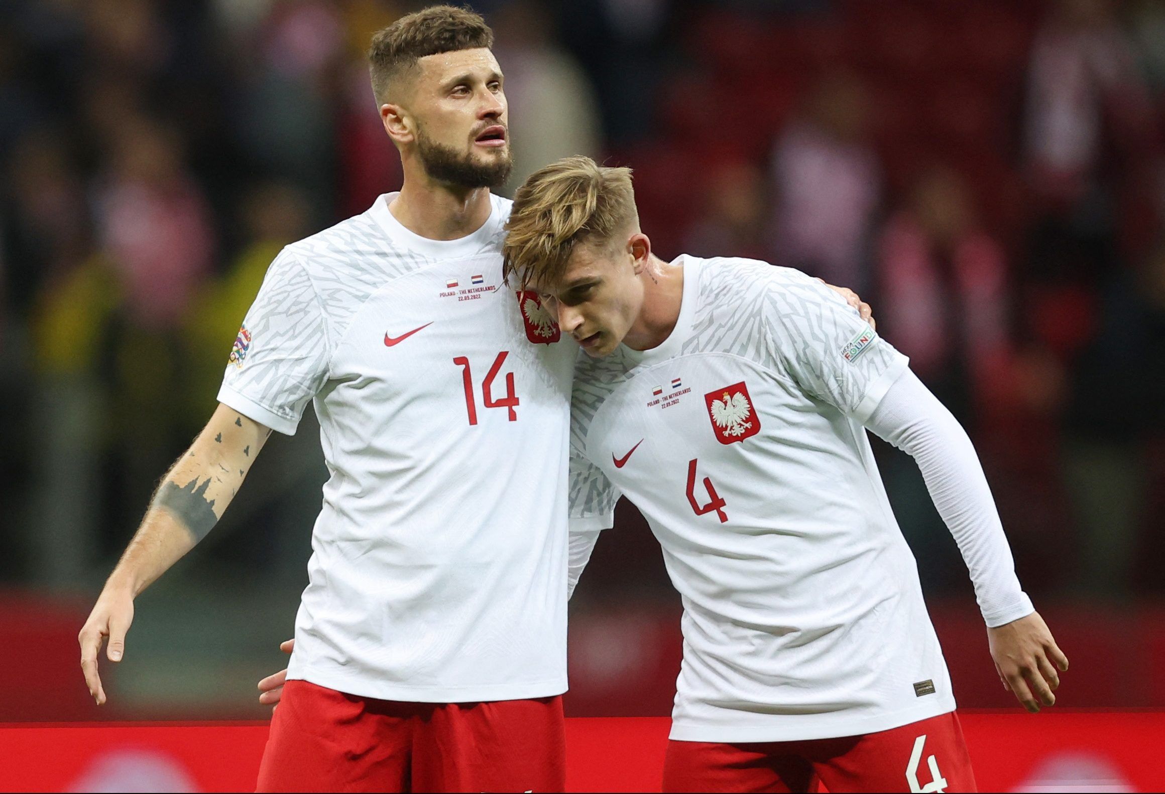 Soccer Football - UEFA Nations League - Group D - Poland v Netherlands - PGE Narodowy, Warsaw, Poland - September 22, 2022 Poland's Mateusz Klich and Michal Skoras look dejected after the match REUTERS/Kacper Pempel