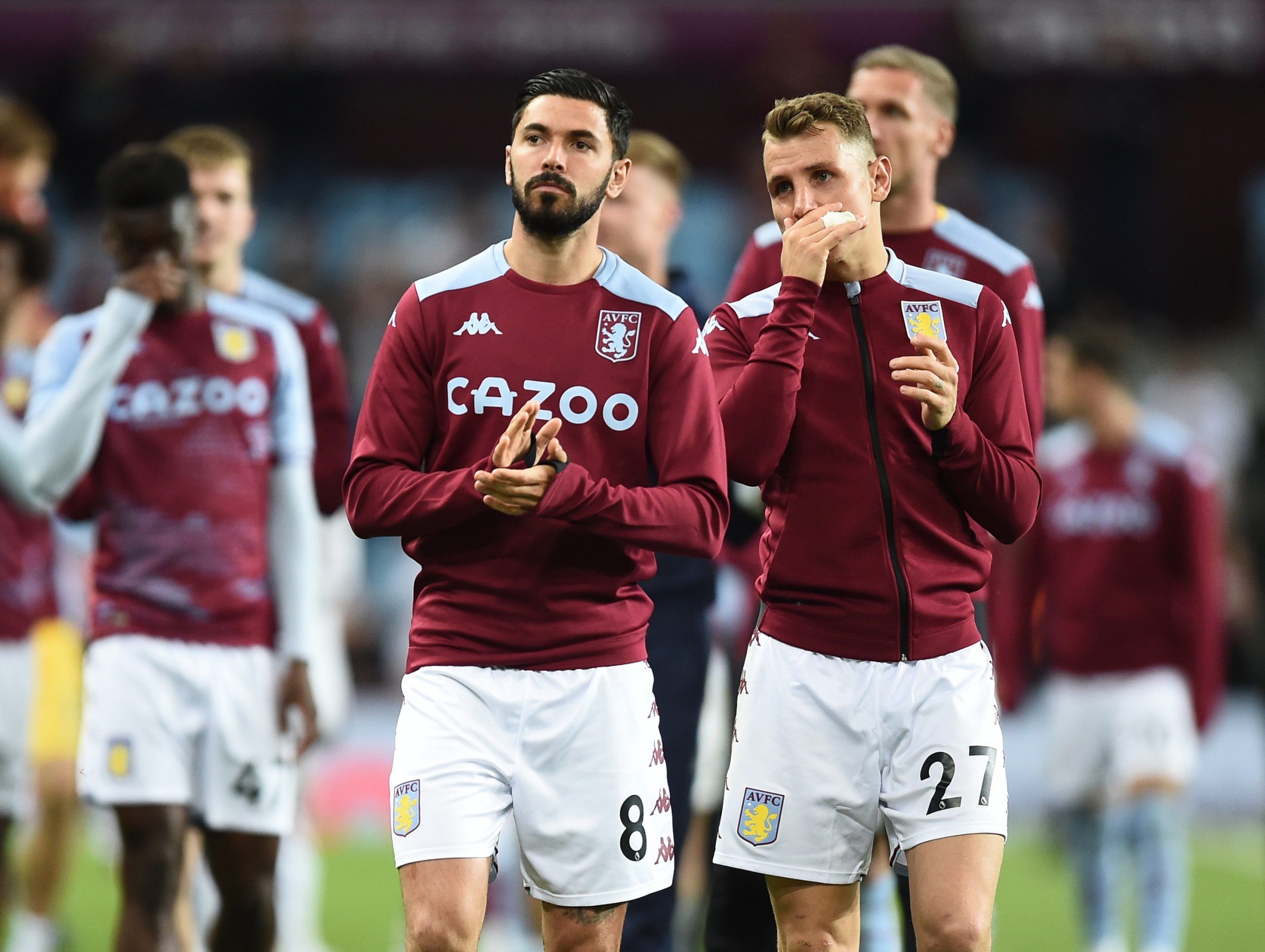 Soccer Football - Premier League - Aston Villa v Burnley - Villa Park, Birmingham, Britain - May 19, 2022 Aston Villa's Morgan Sanson with Lucas Digne after the match Action Images via Reuters/Peter Powell EDITORIAL USE ONLY. No use with unauthorized audio, video, data, fixture lists, club/league logos or 'live' services. Online in-match use limited to 75 images, no video emulation. No use in betting, games or single club /league/player publications.  Please contact your account representative f